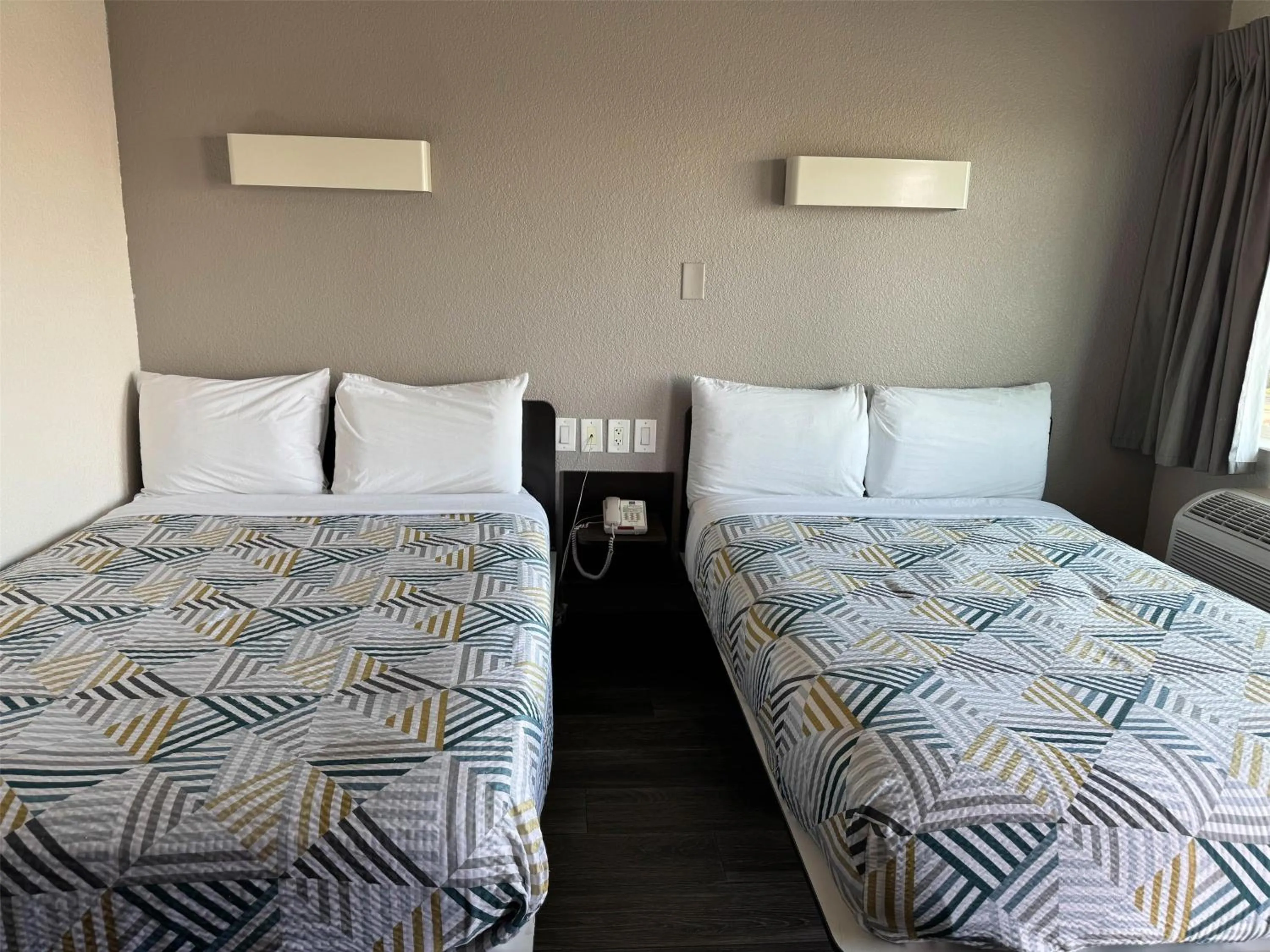 Photo of the whole room, Bed in Studio 6 Suites Las Vegas, NV - Tropicana