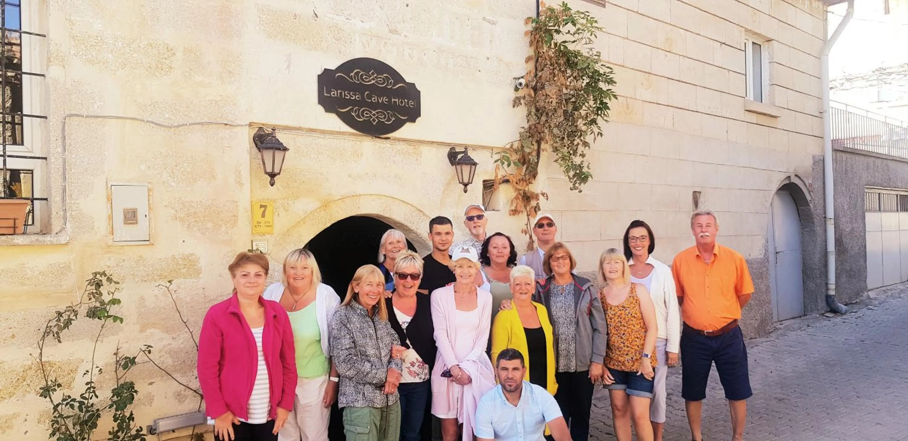 People in Larissa Cave Hotel