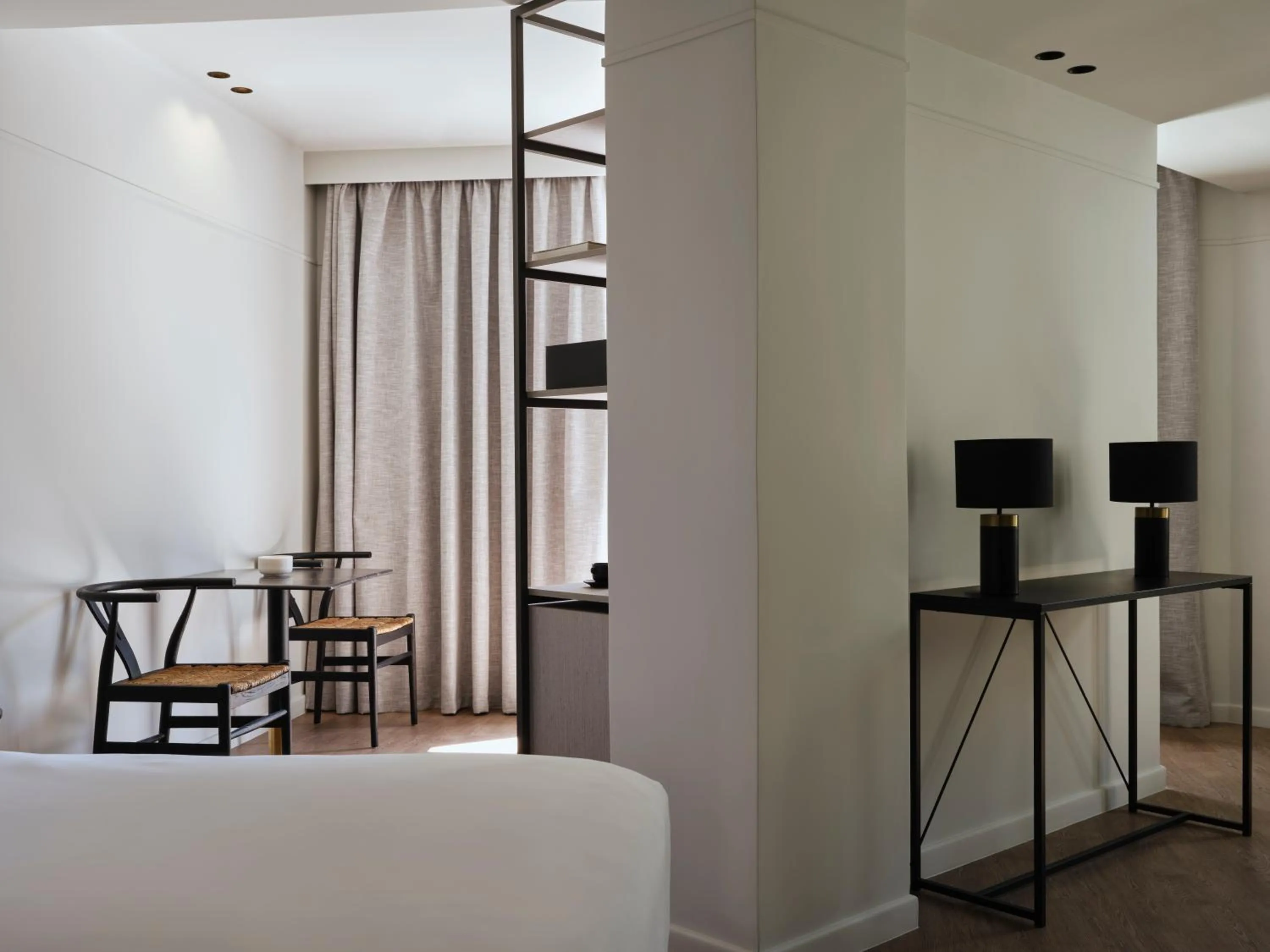 Photo of the whole room, Bed in Doryssa Lithos Hotel