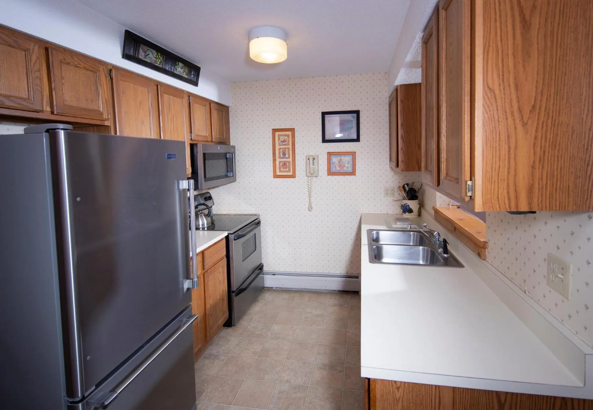 Kitchen or kitchenette in Okemo Mountain Lodging