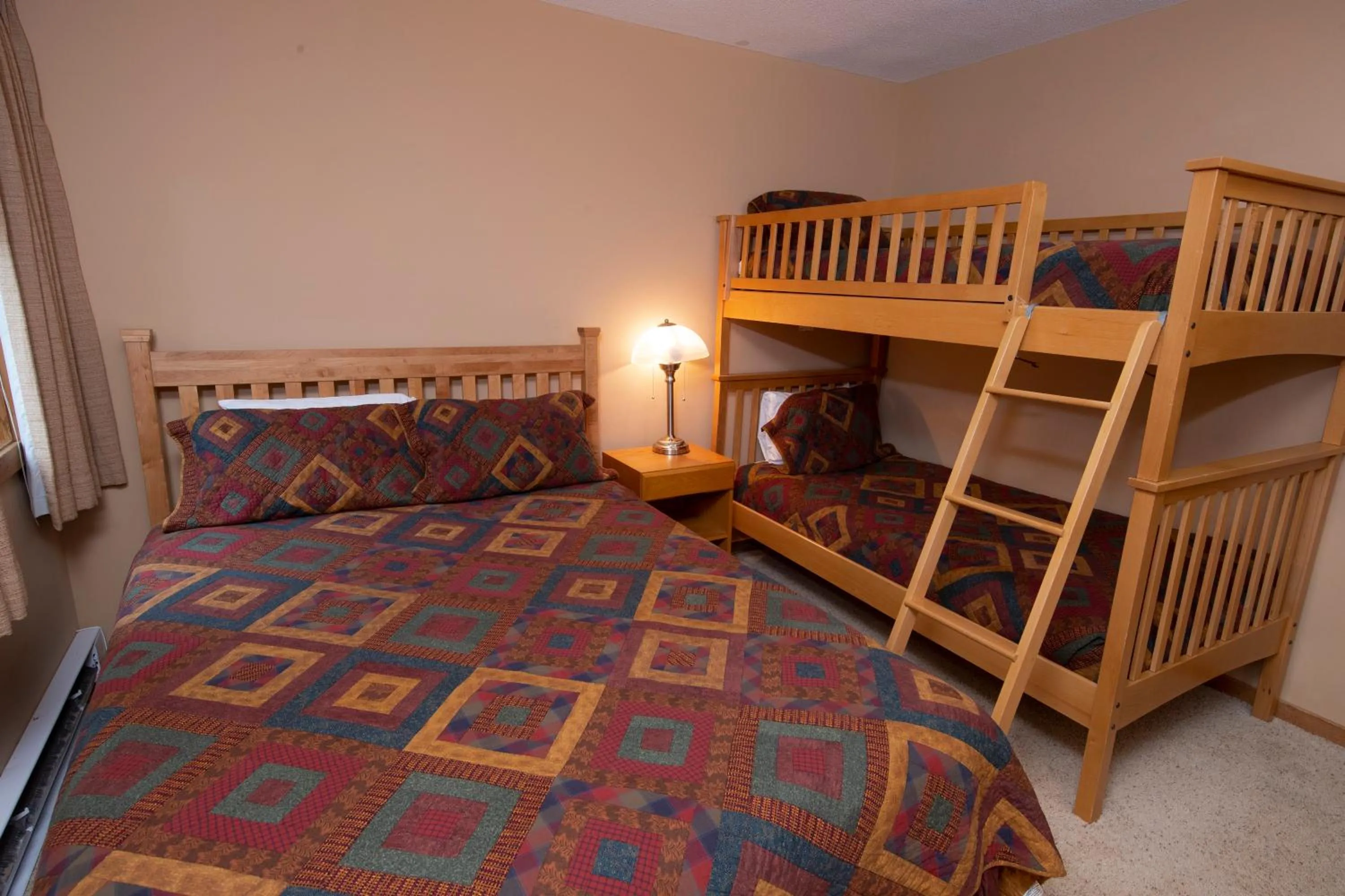 Bed in Okemo Mountain Lodging