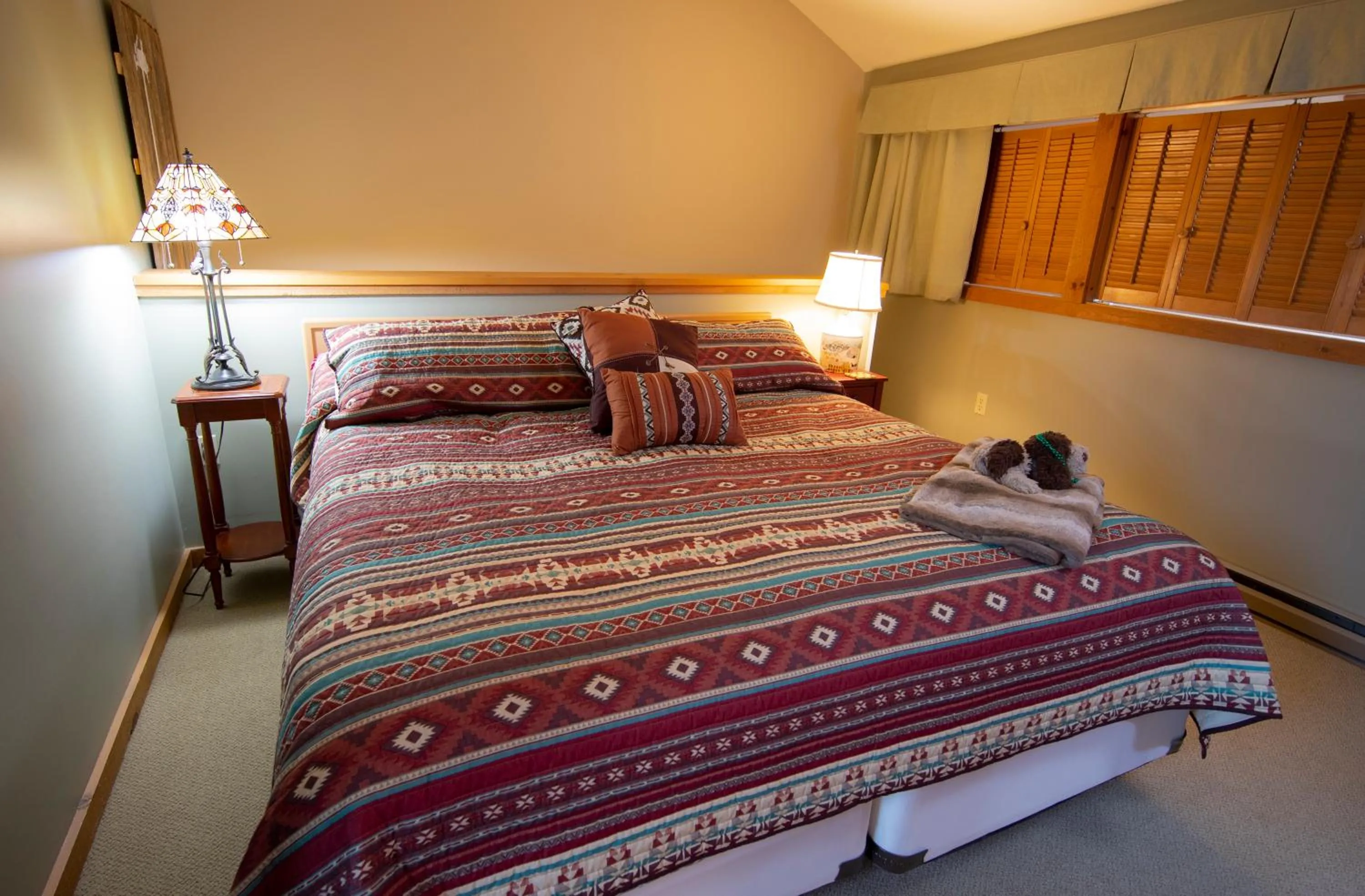 Bed in Okemo Mountain Lodging