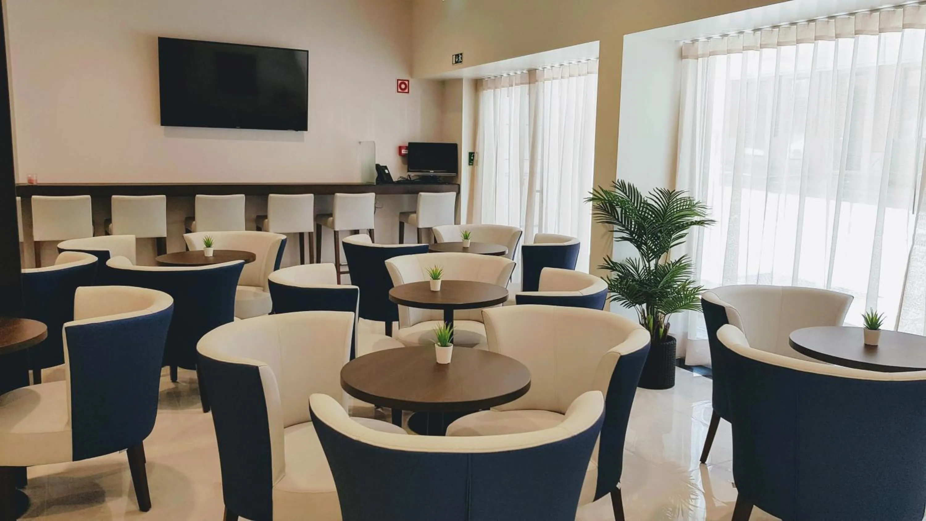 Lobby or reception in Porto City Hotel