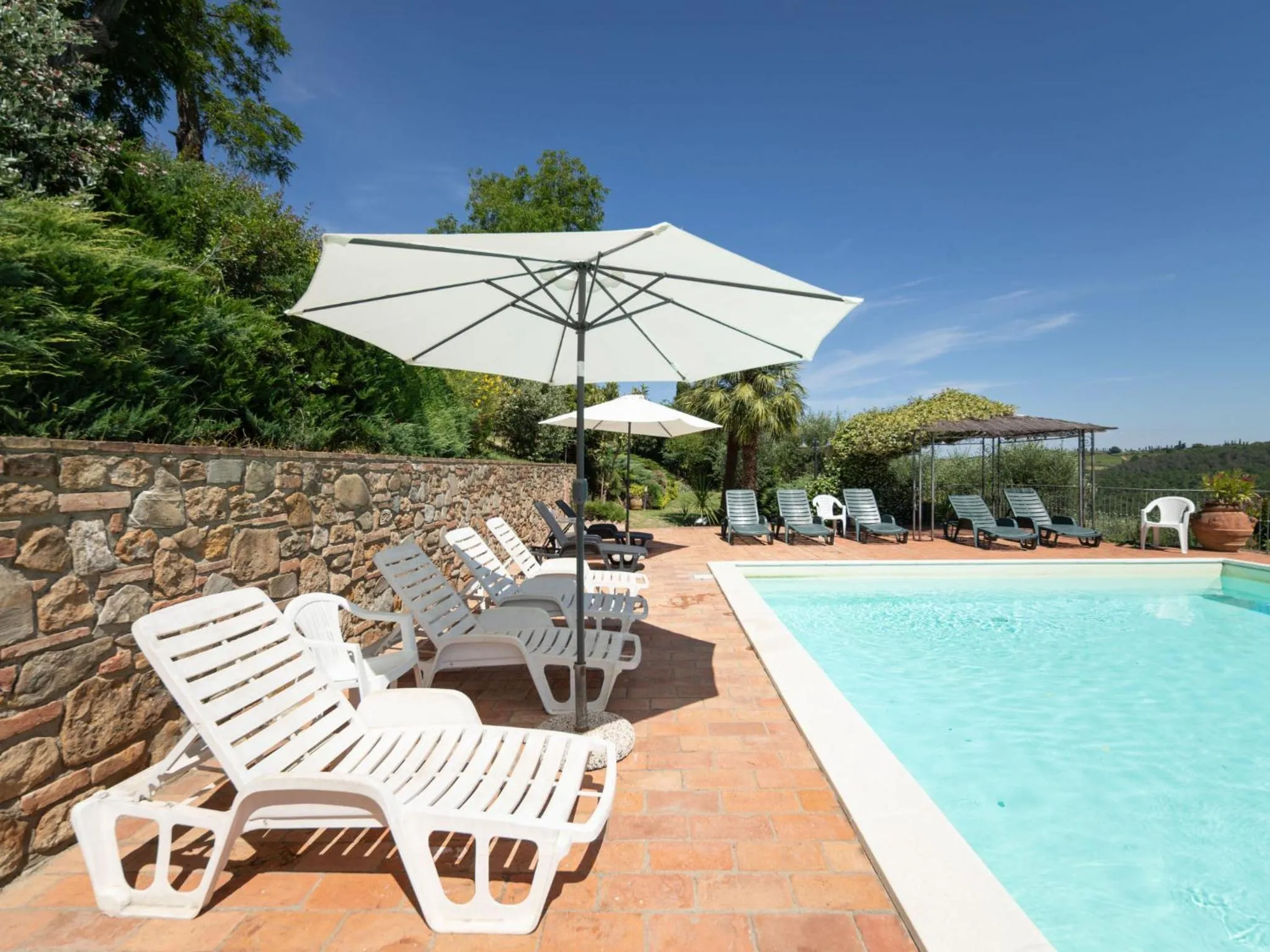 Swimming pool in Apartment Galileo by Interhome