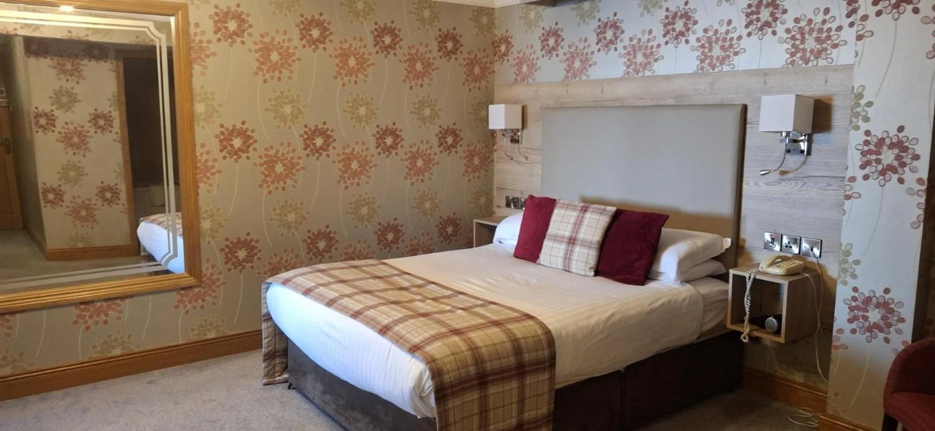 Bed in Royal Court Hotel