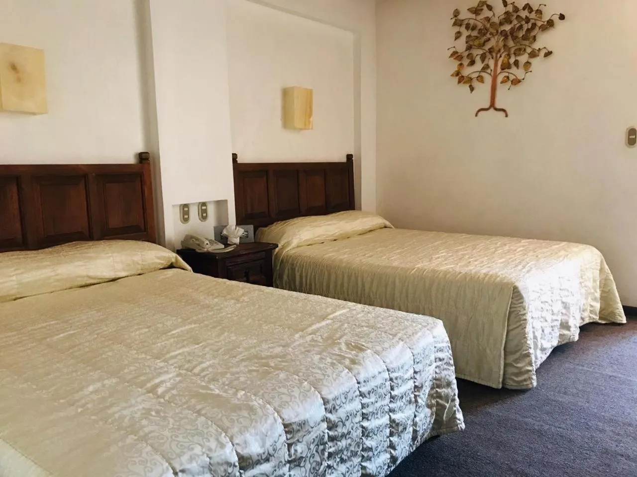 Bed in Hotel La Mansión