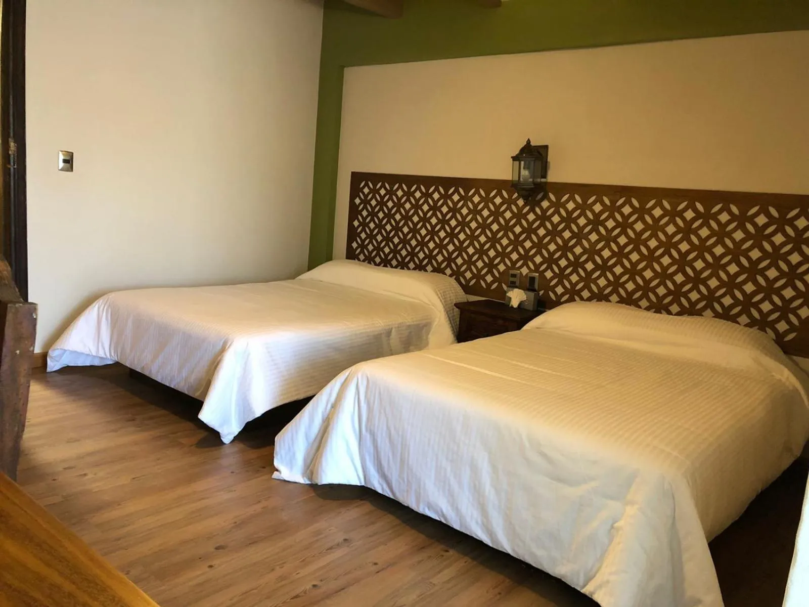 Bed in Hotel La Mansión