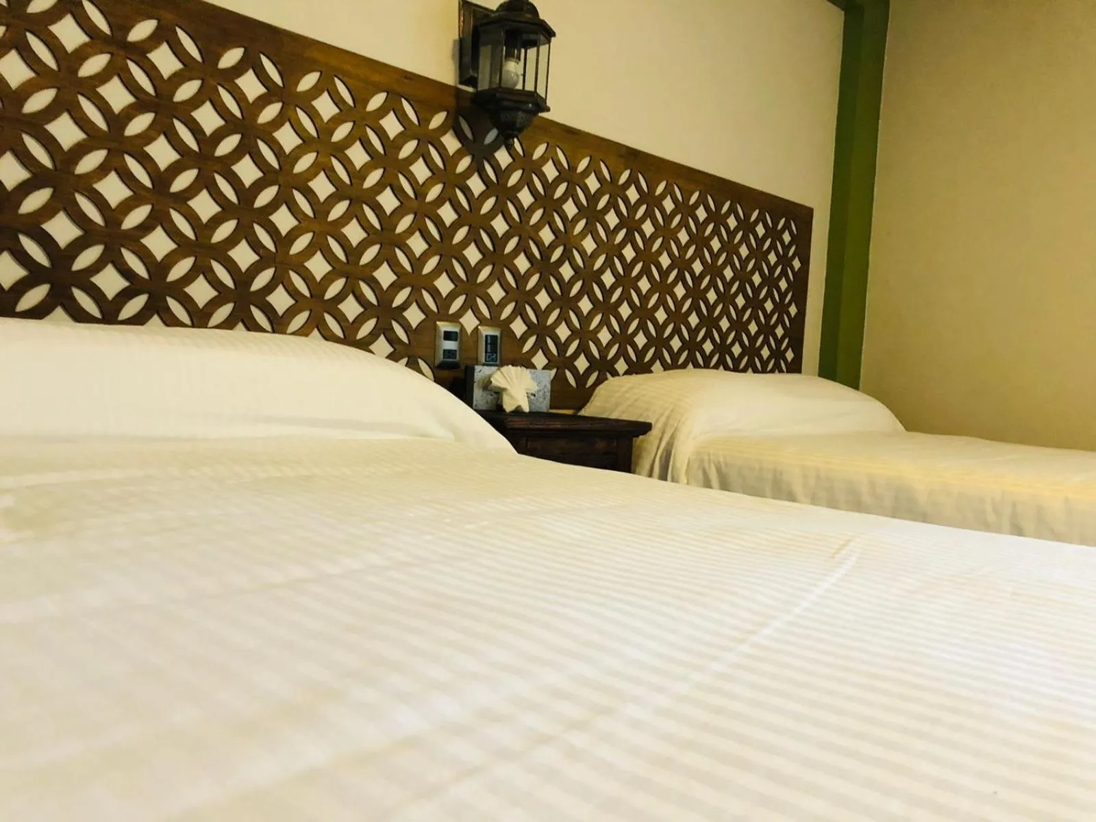 Bed in Hotel La Mansión