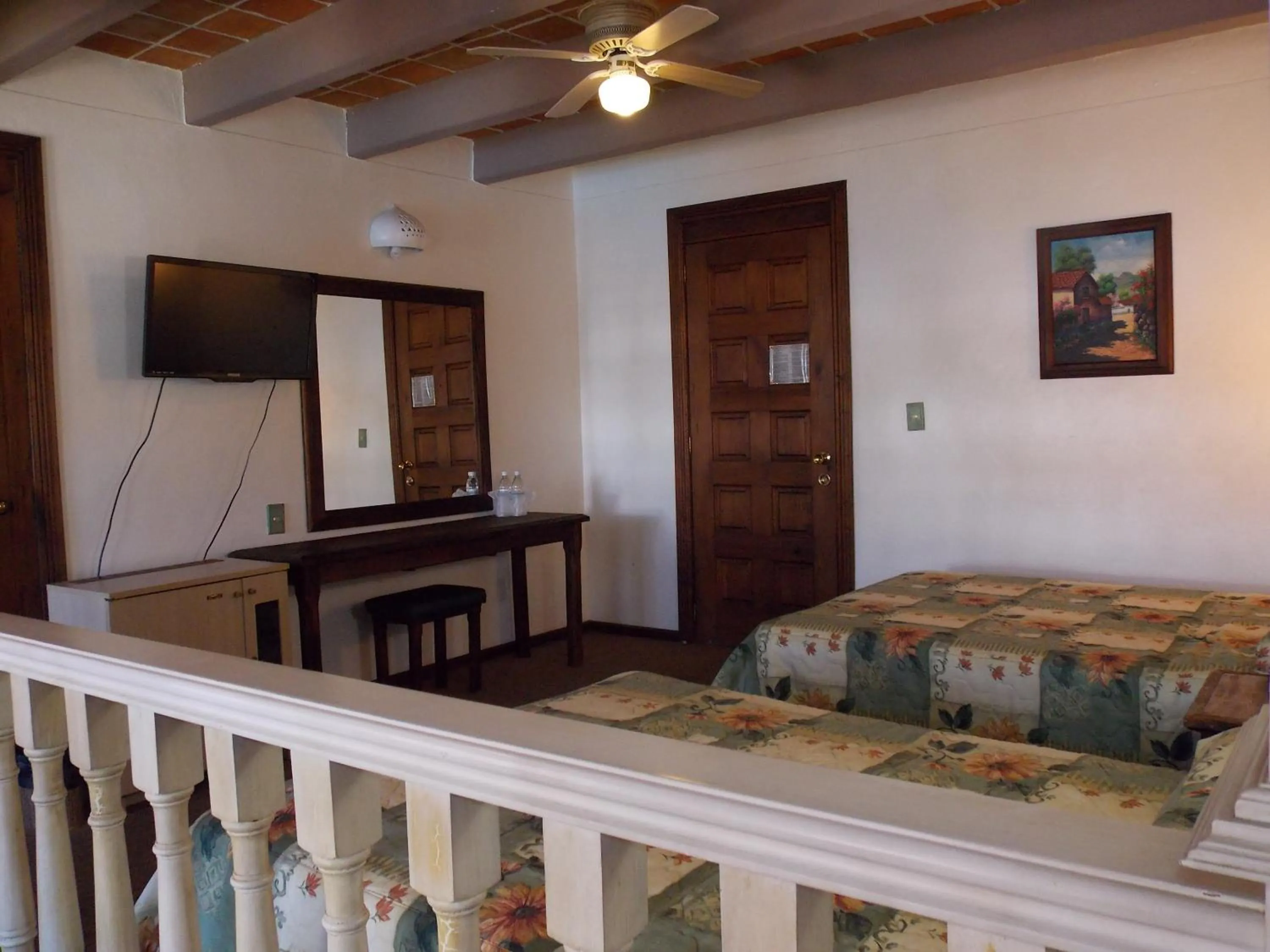 Bedroom in Hotel La Mansión