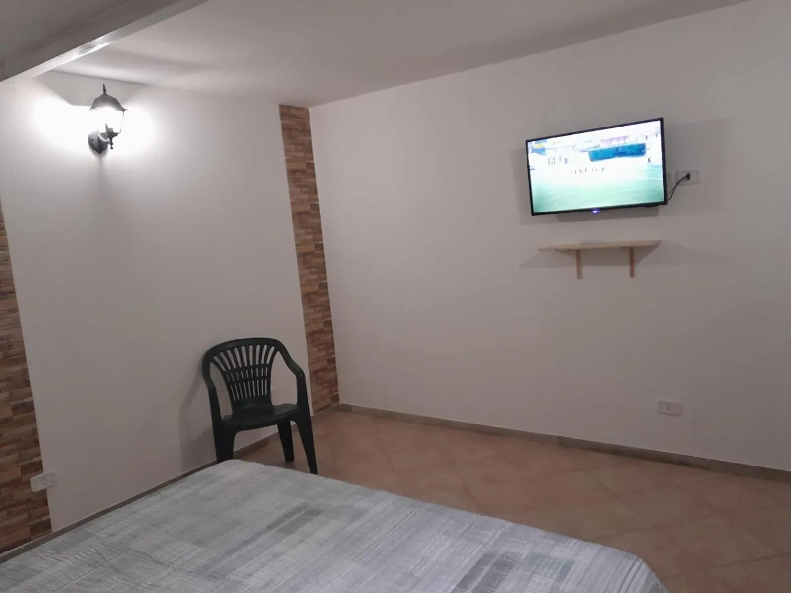 Bed in BeaStella Holiday Rooms