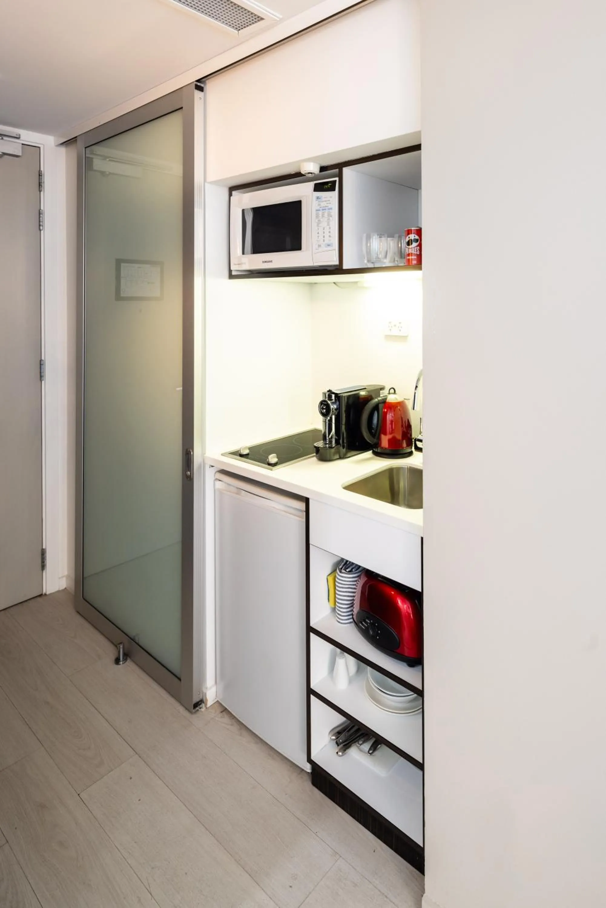 Kitchen or kitchenette in Queenstown Park Boutique Hotel