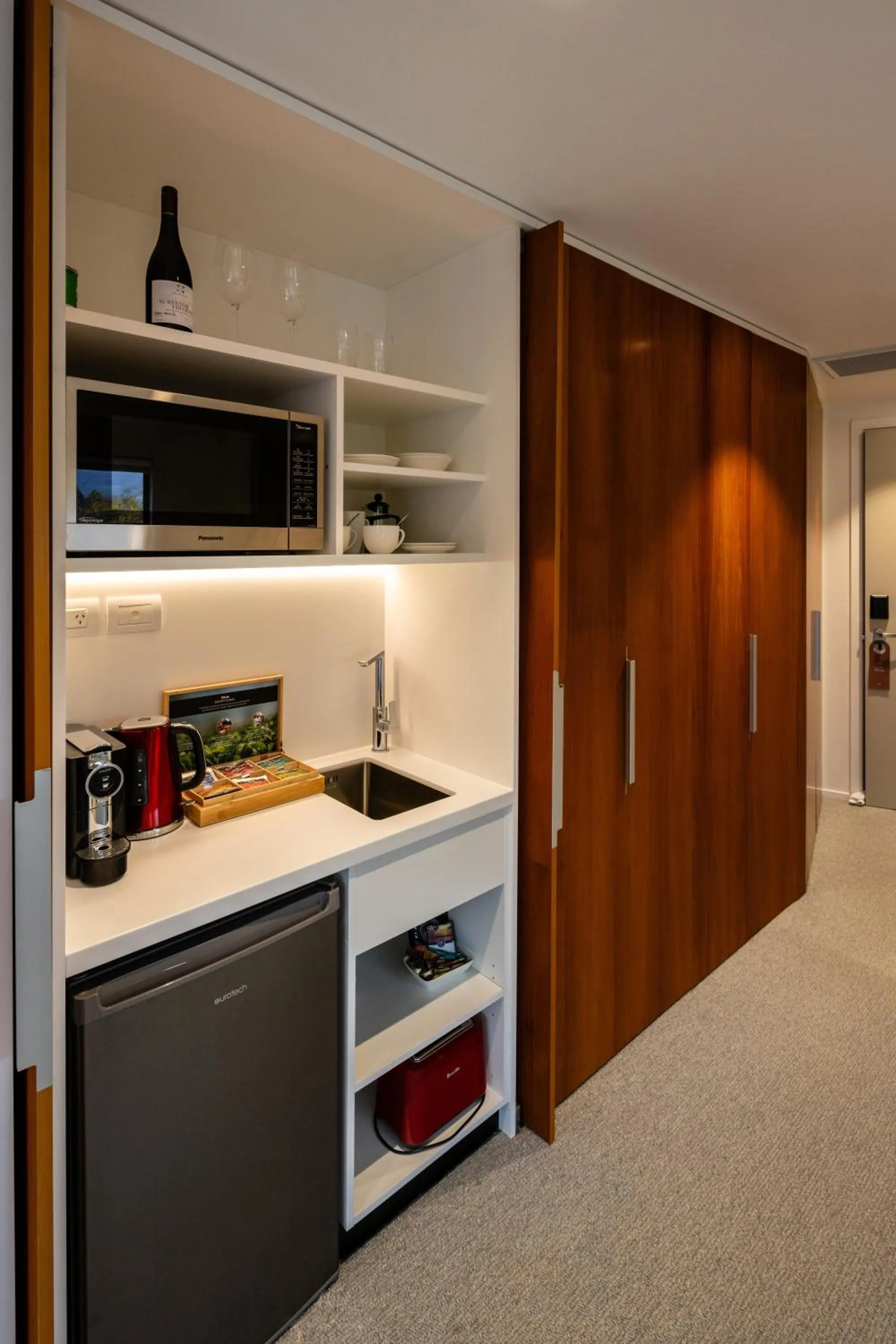 Kitchen or kitchenette in Queenstown Park Boutique Hotel