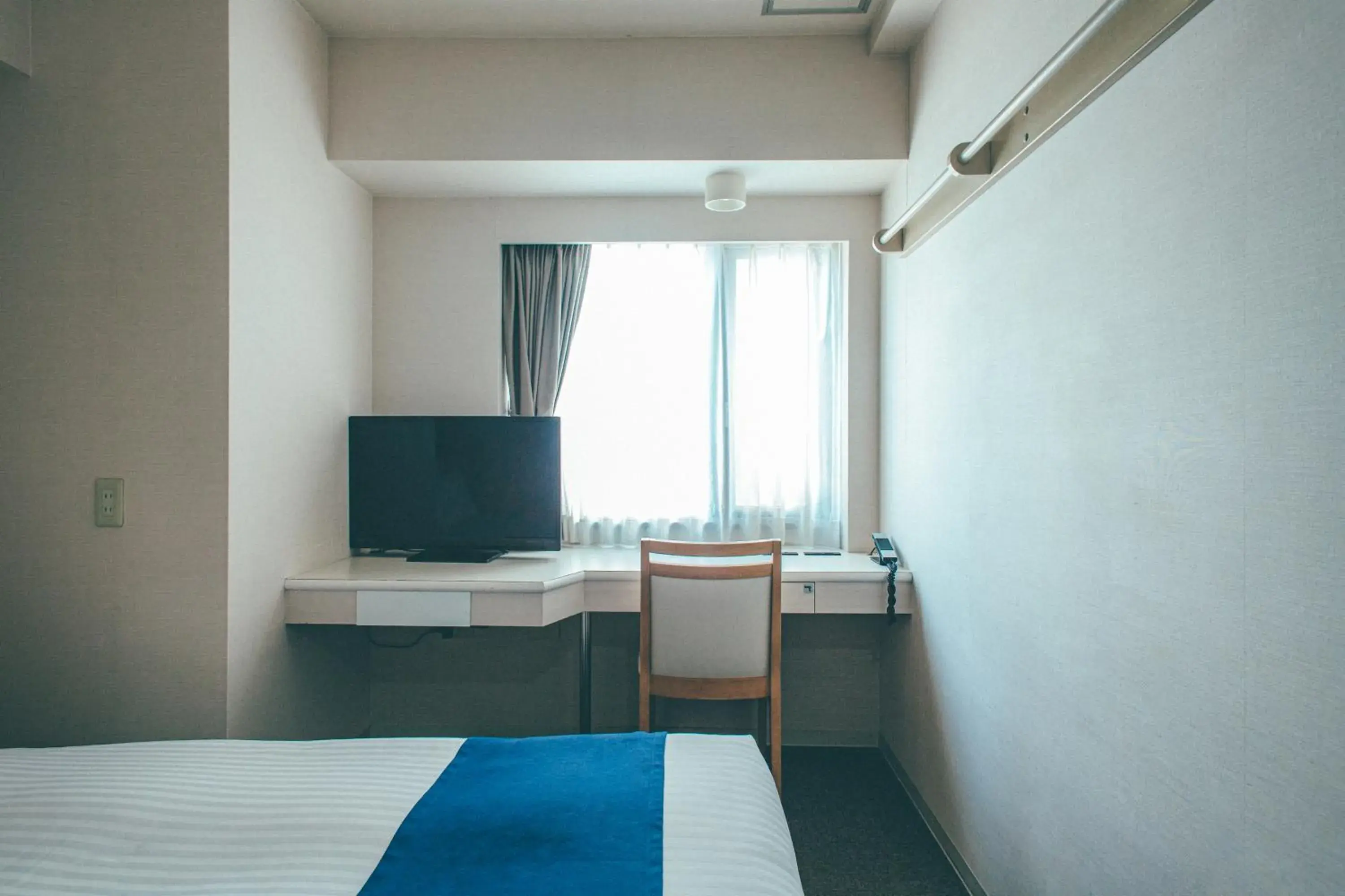 Single Room in Hamilton Hotel Blue Single Room in Hamilton Hotel Blue