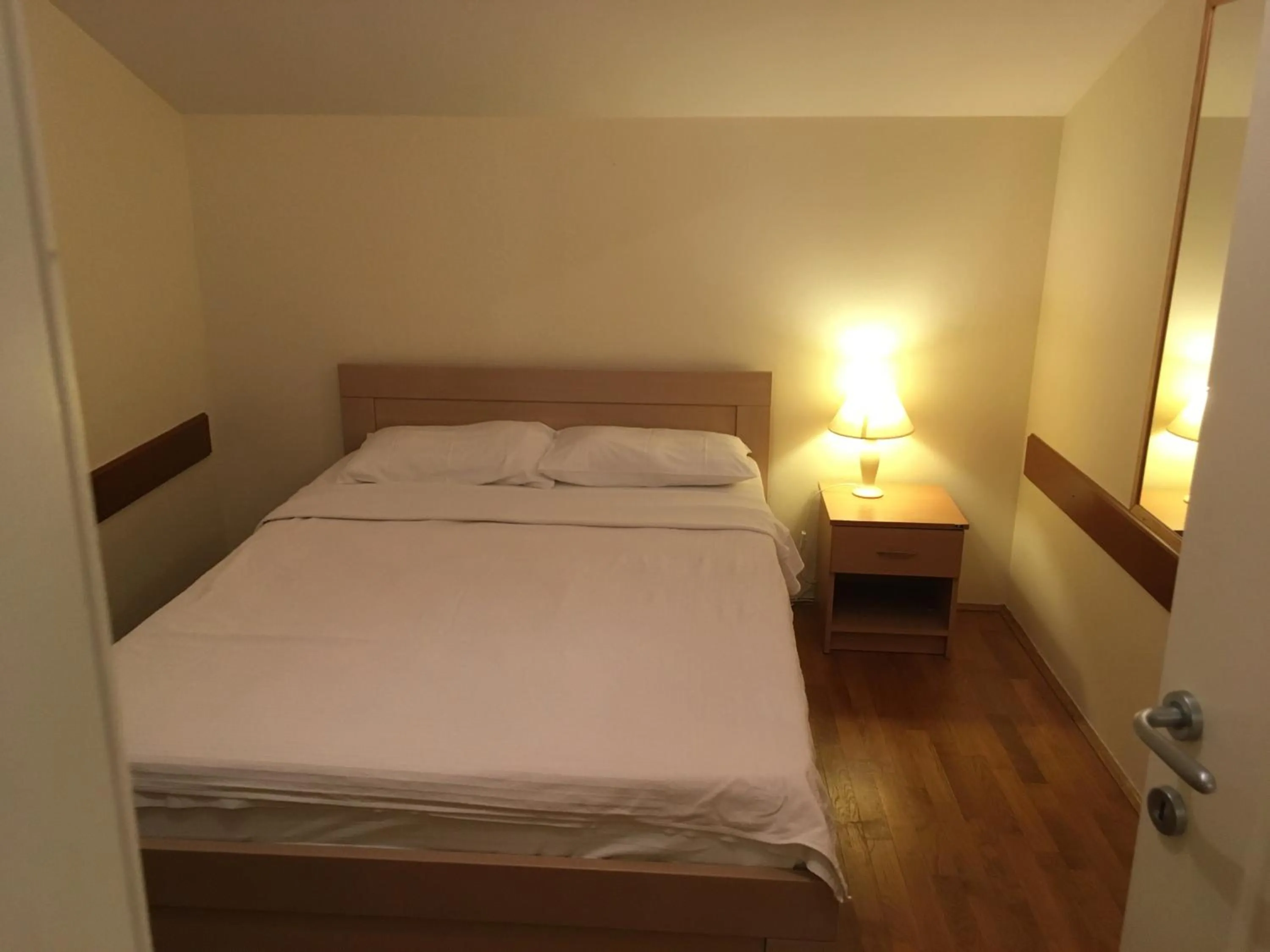 Bed in Apartments Maslina
