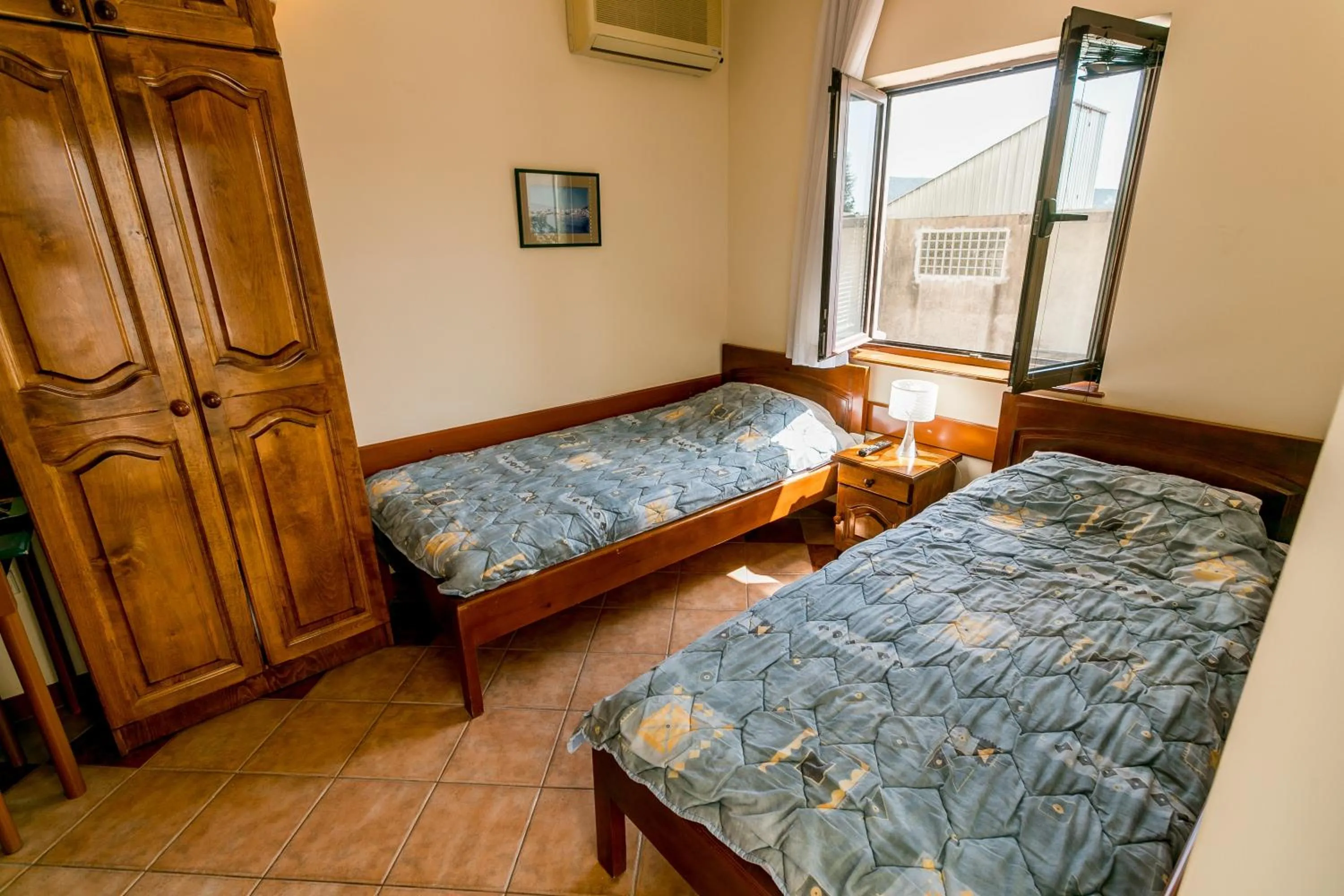 Bed in Apartments Maslina