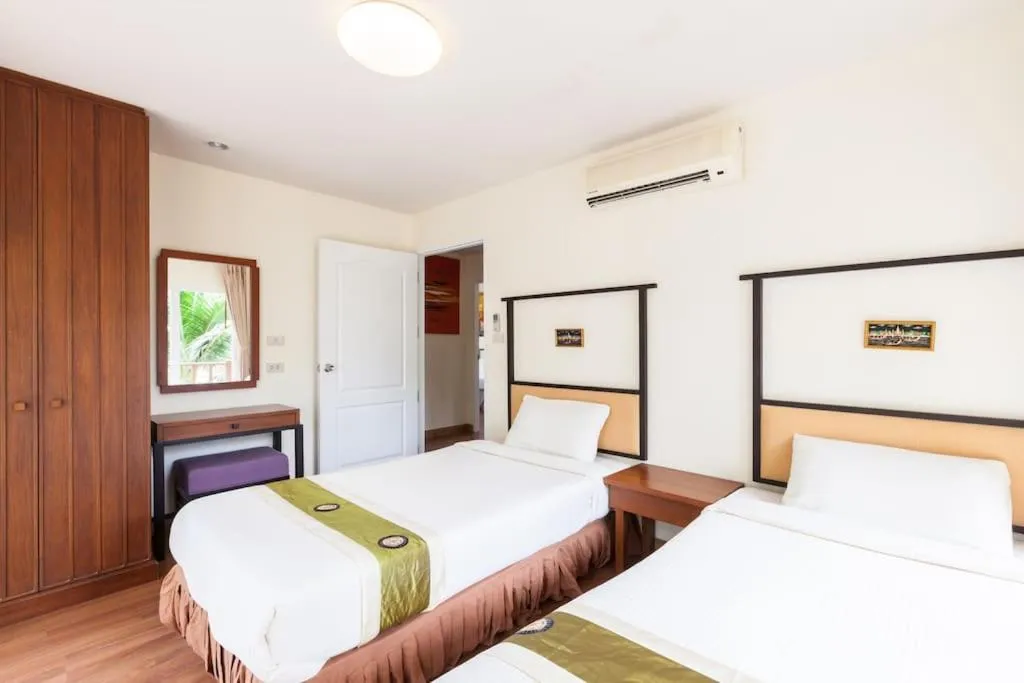 Bed in Baan Talay Samran 4 Bedrooms Villa with Beach and 3 pools