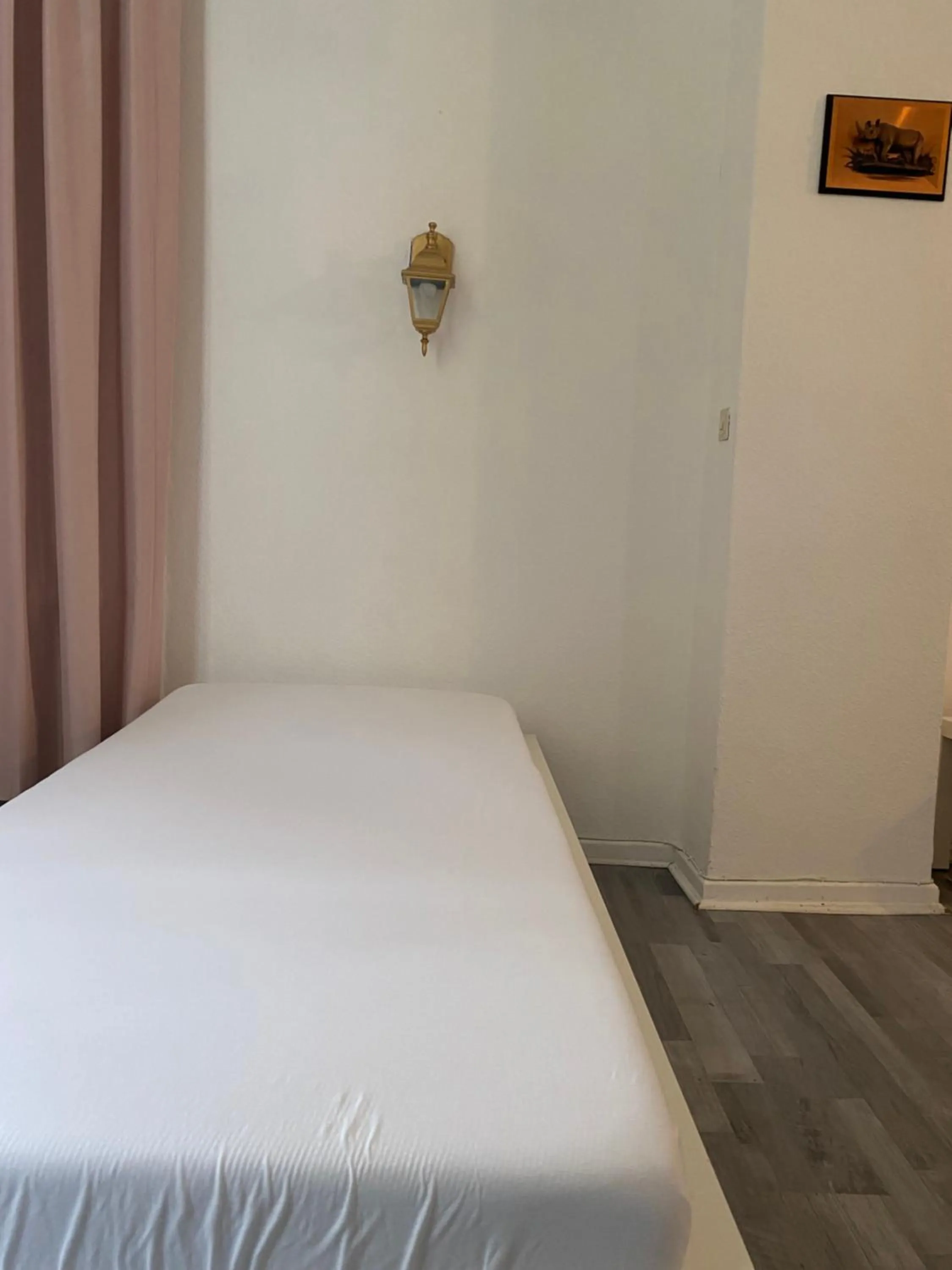 Bed in A&S Ferienwohnungen Koblenzer Strasse