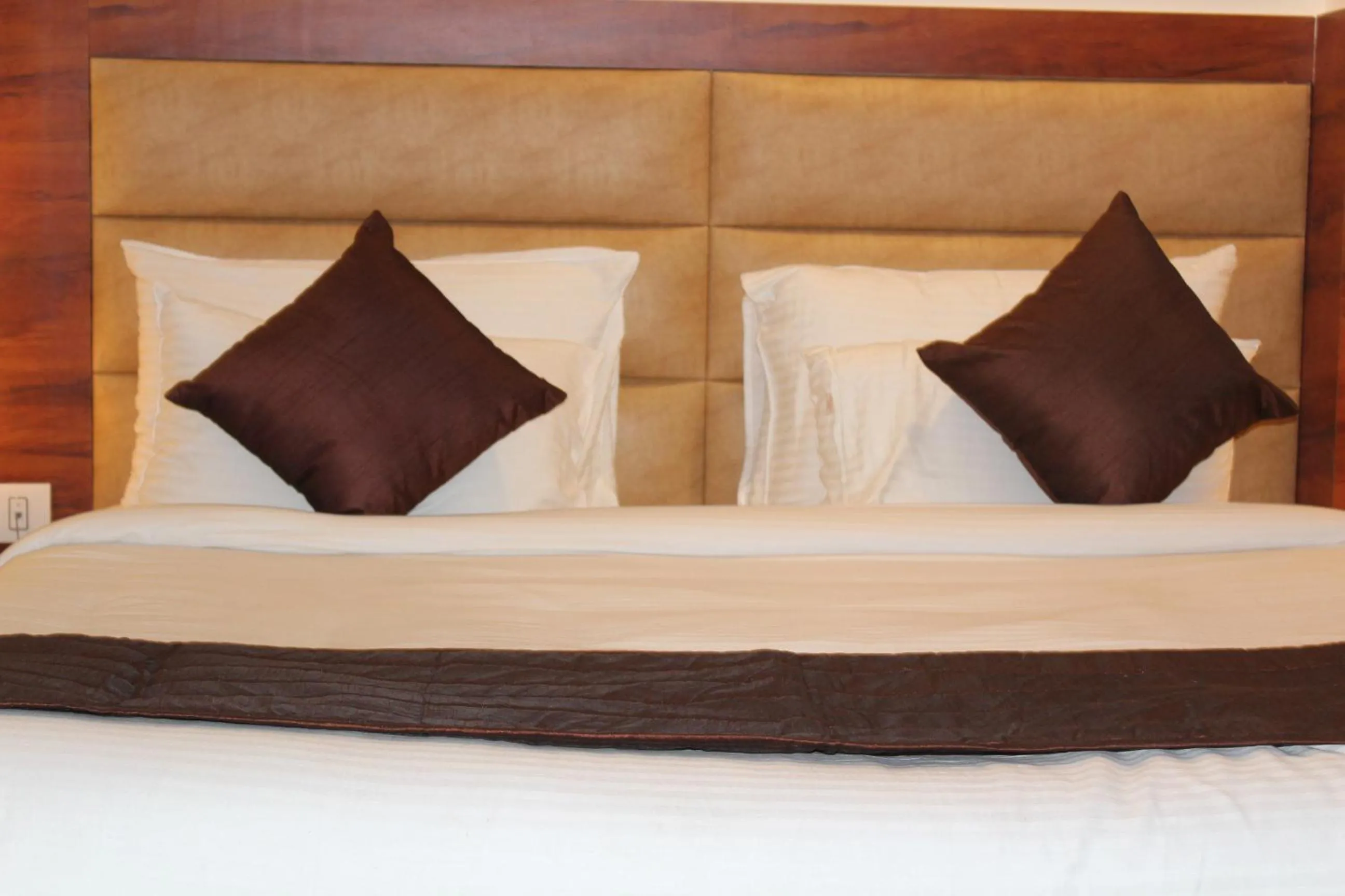 Bed in Red Crown Hotel