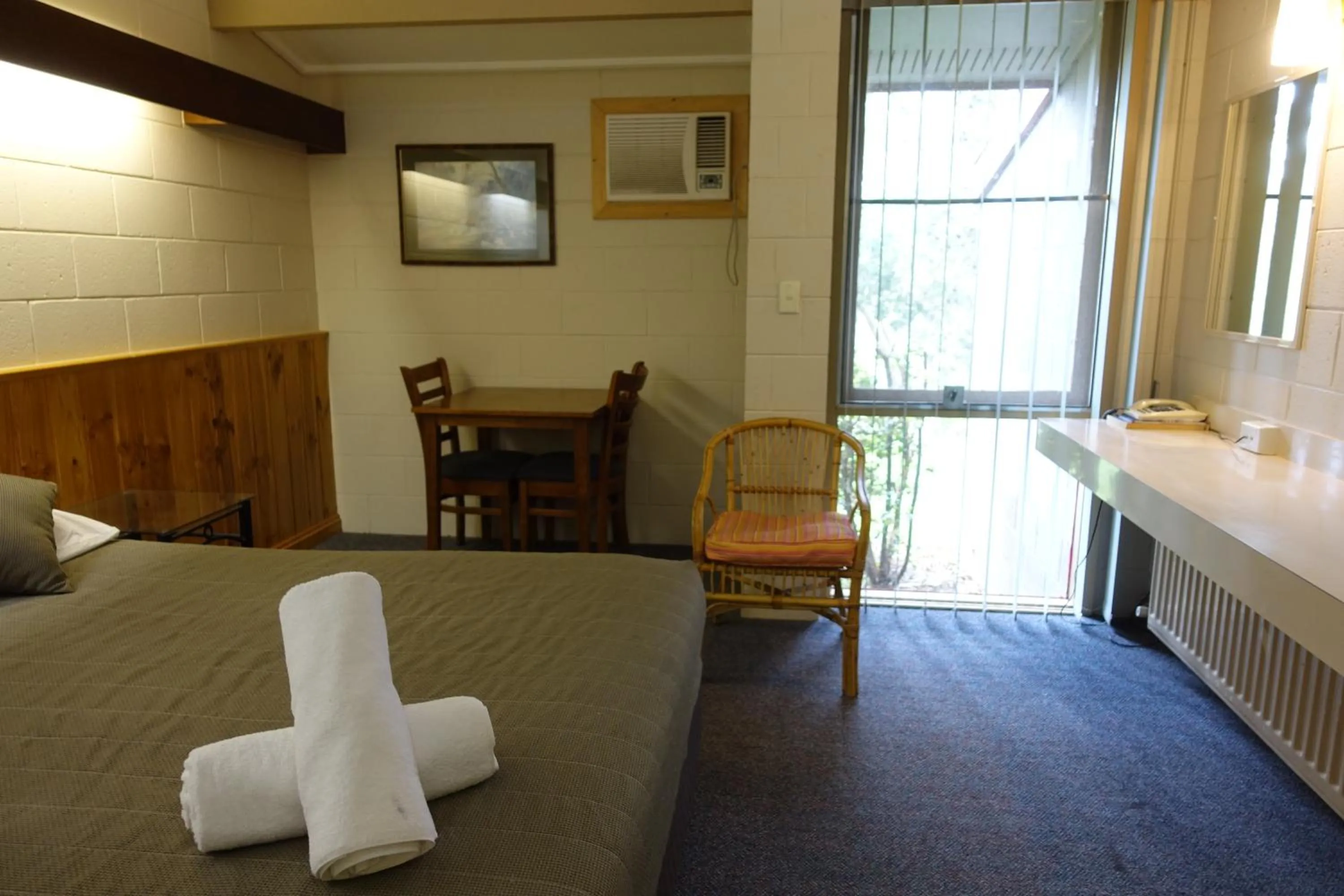 Bed in Coal Creek Motel