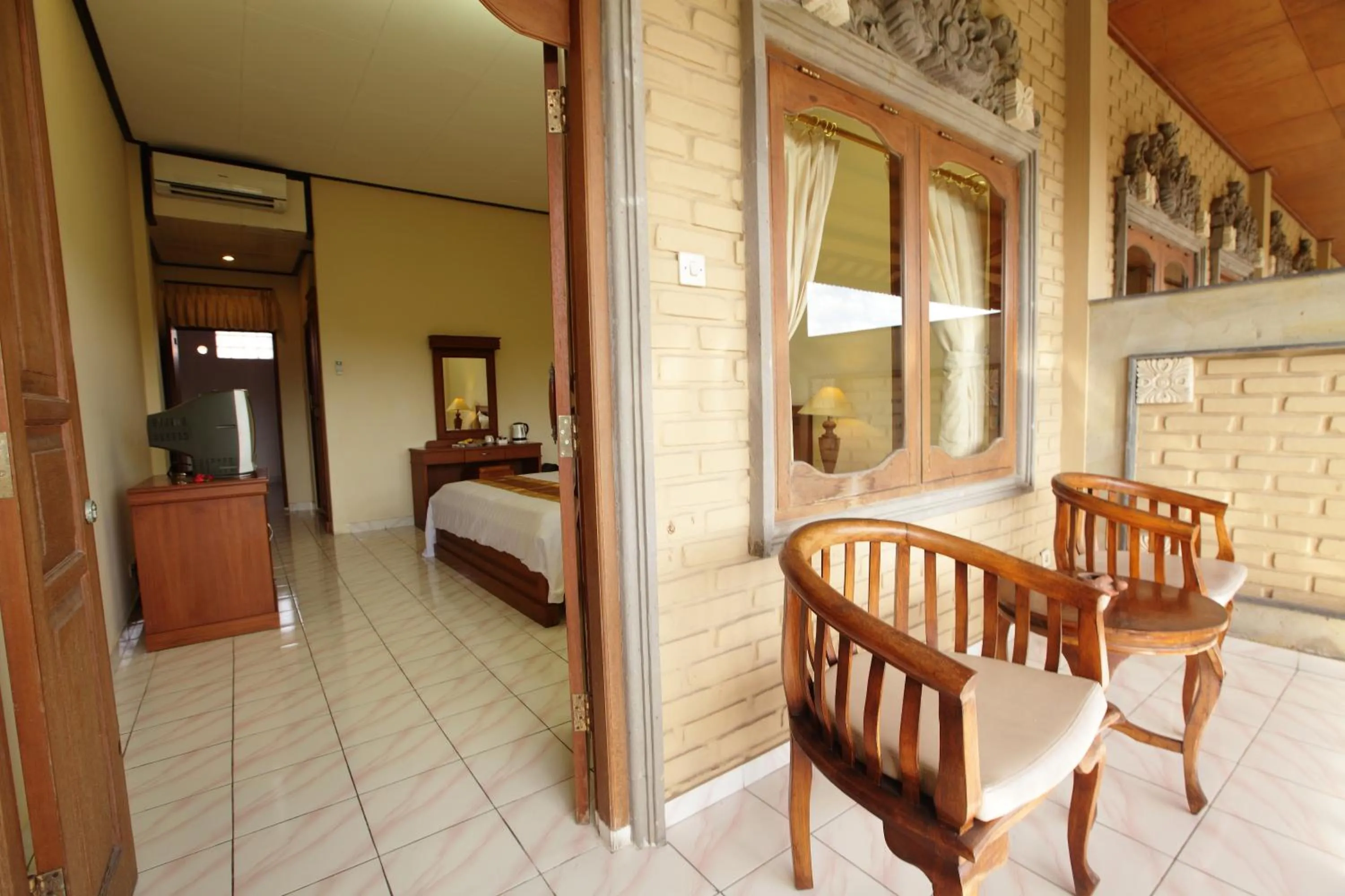 Balcony/Terrace, Bed in Bali Sandy Resort