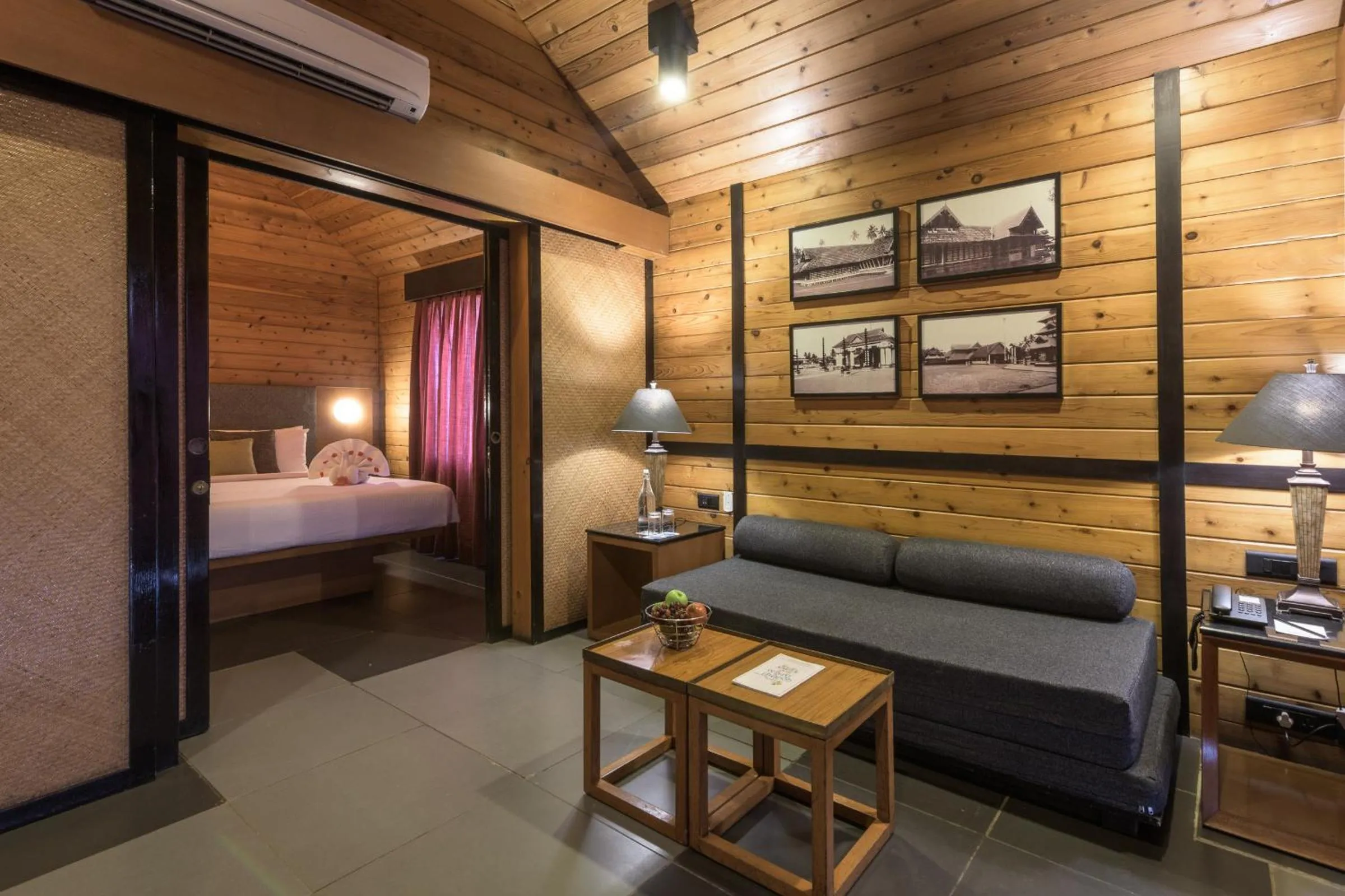 Living room, Bed in Club Mahindra Ashtamudi