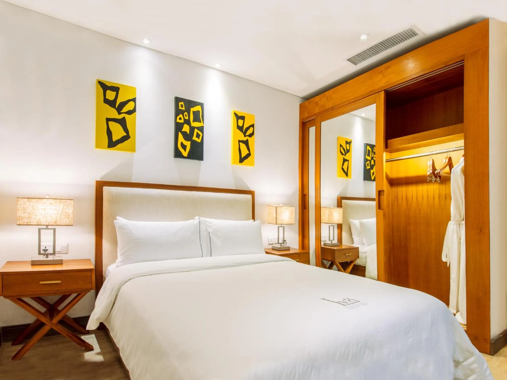 Bed in Lv8 Resort Hotel