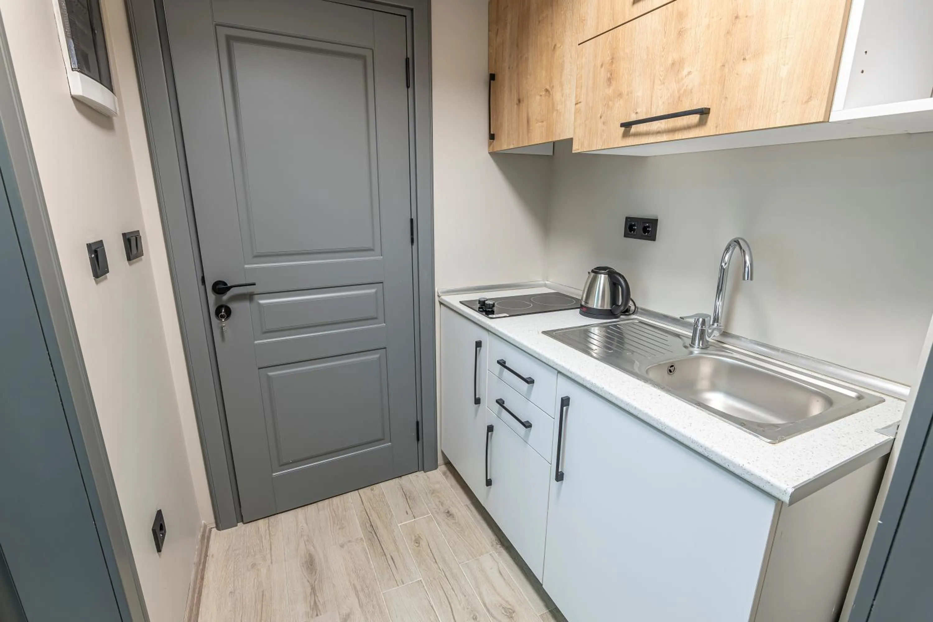 Kitchen or kitchenette in Calanthe Residence