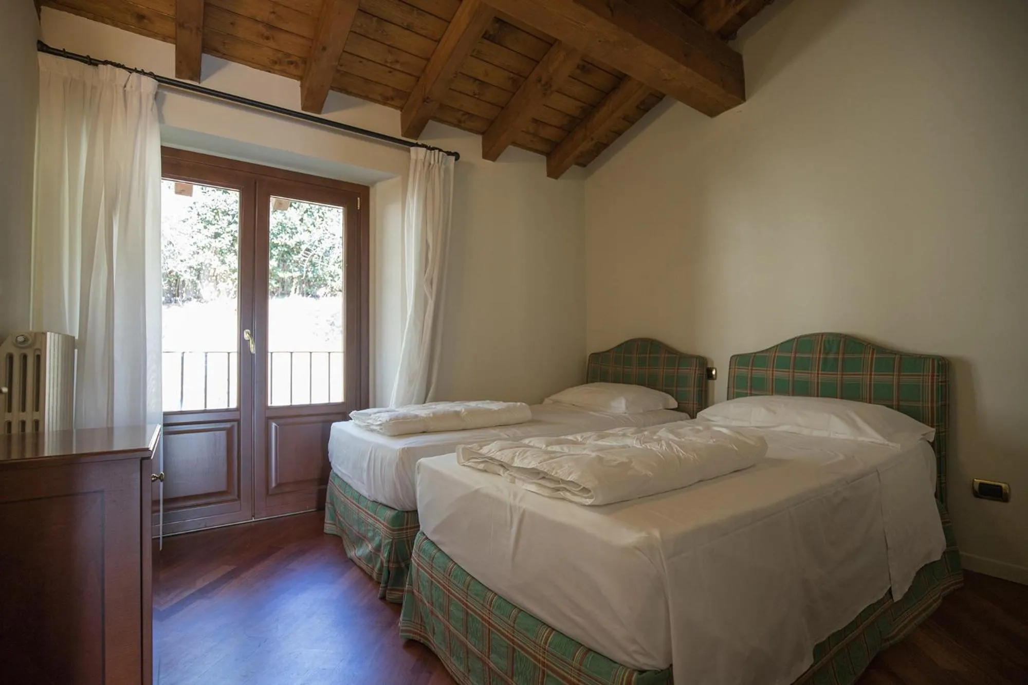 Bed in Apartments Golf Bogliaco