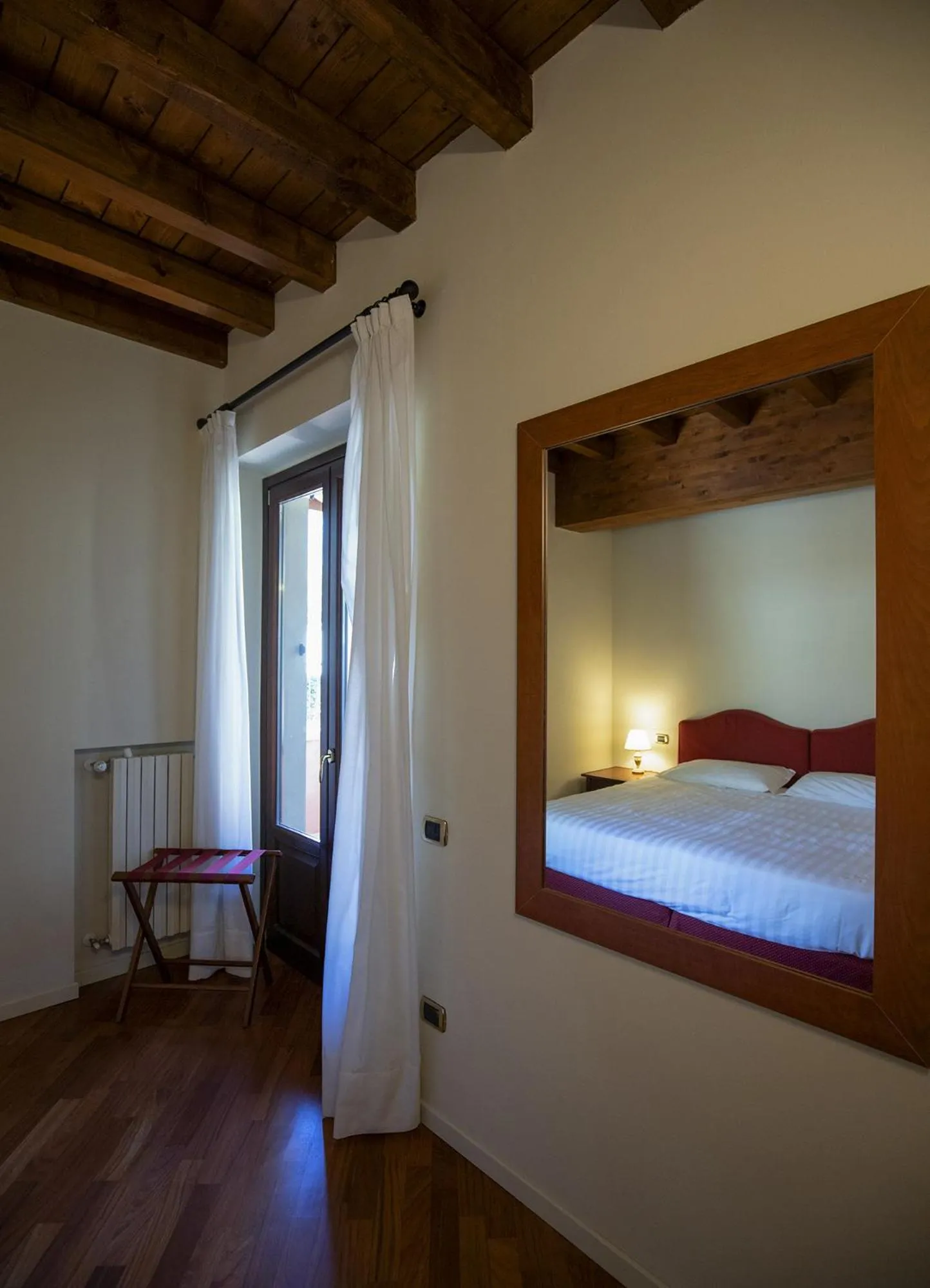 Bed in Apartments Golf Bogliaco