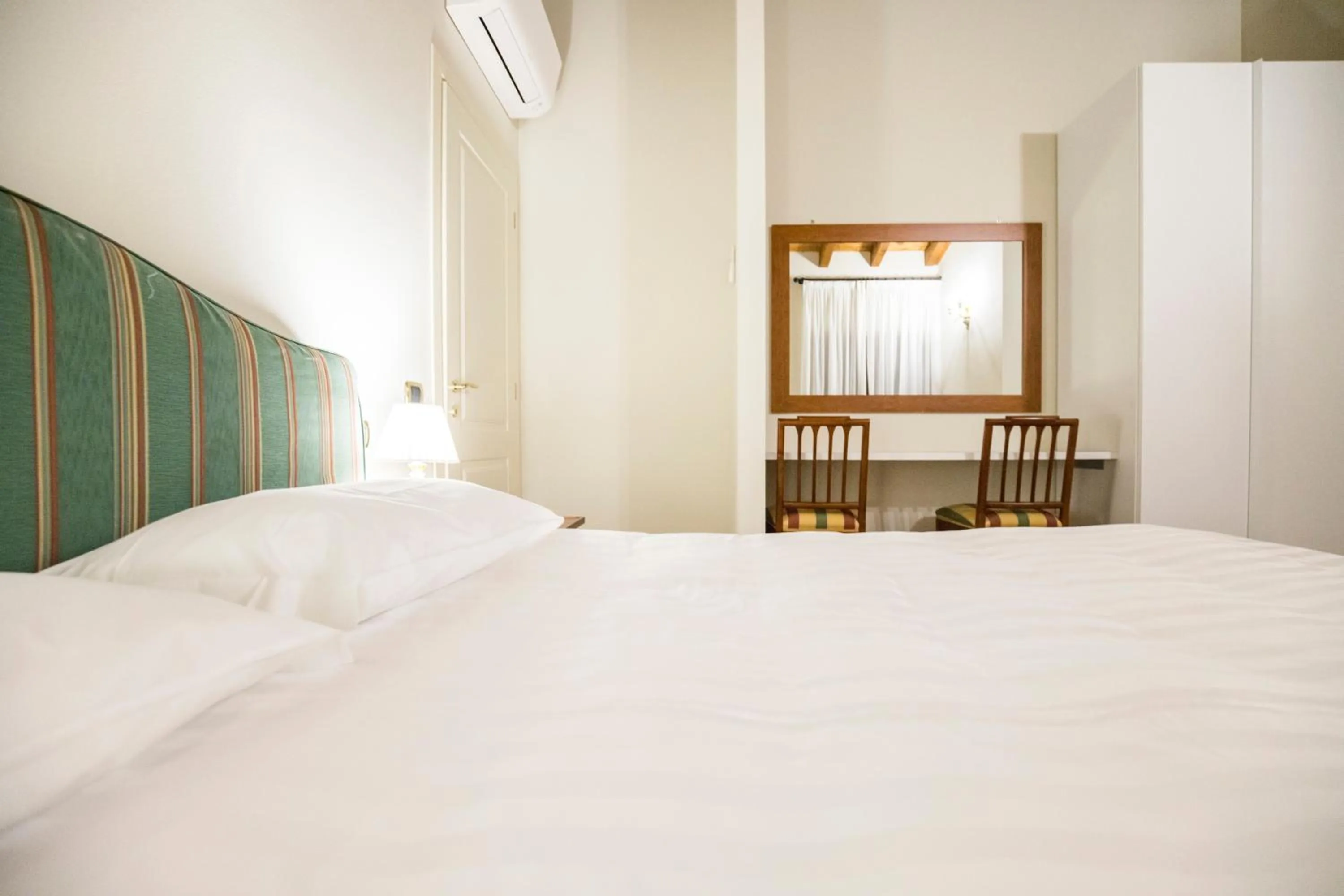 Bed in Apartments Golf Bogliaco