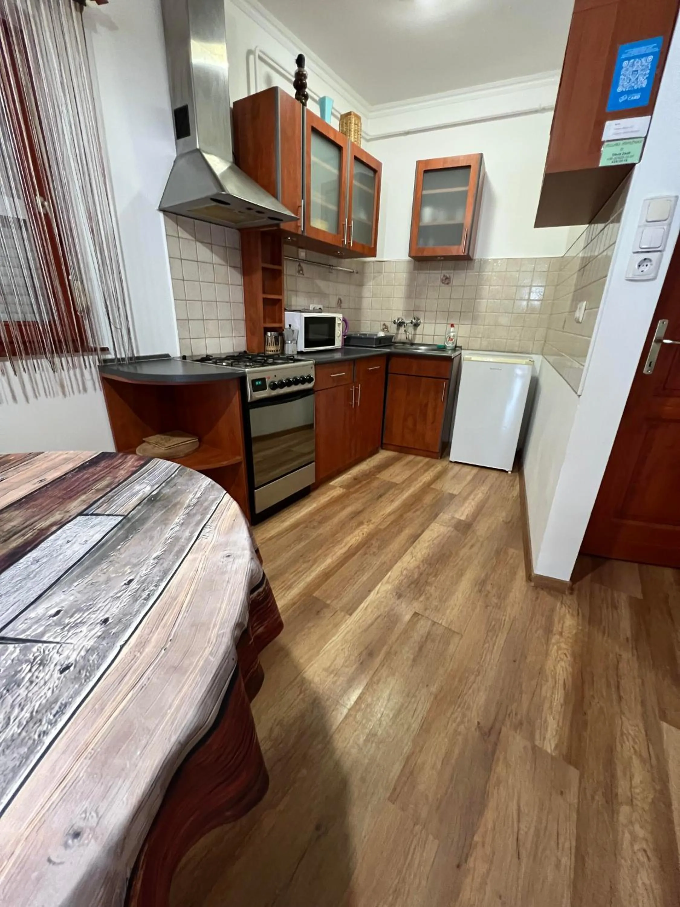 Kitchen or kitchenette in Hellasz Apartman