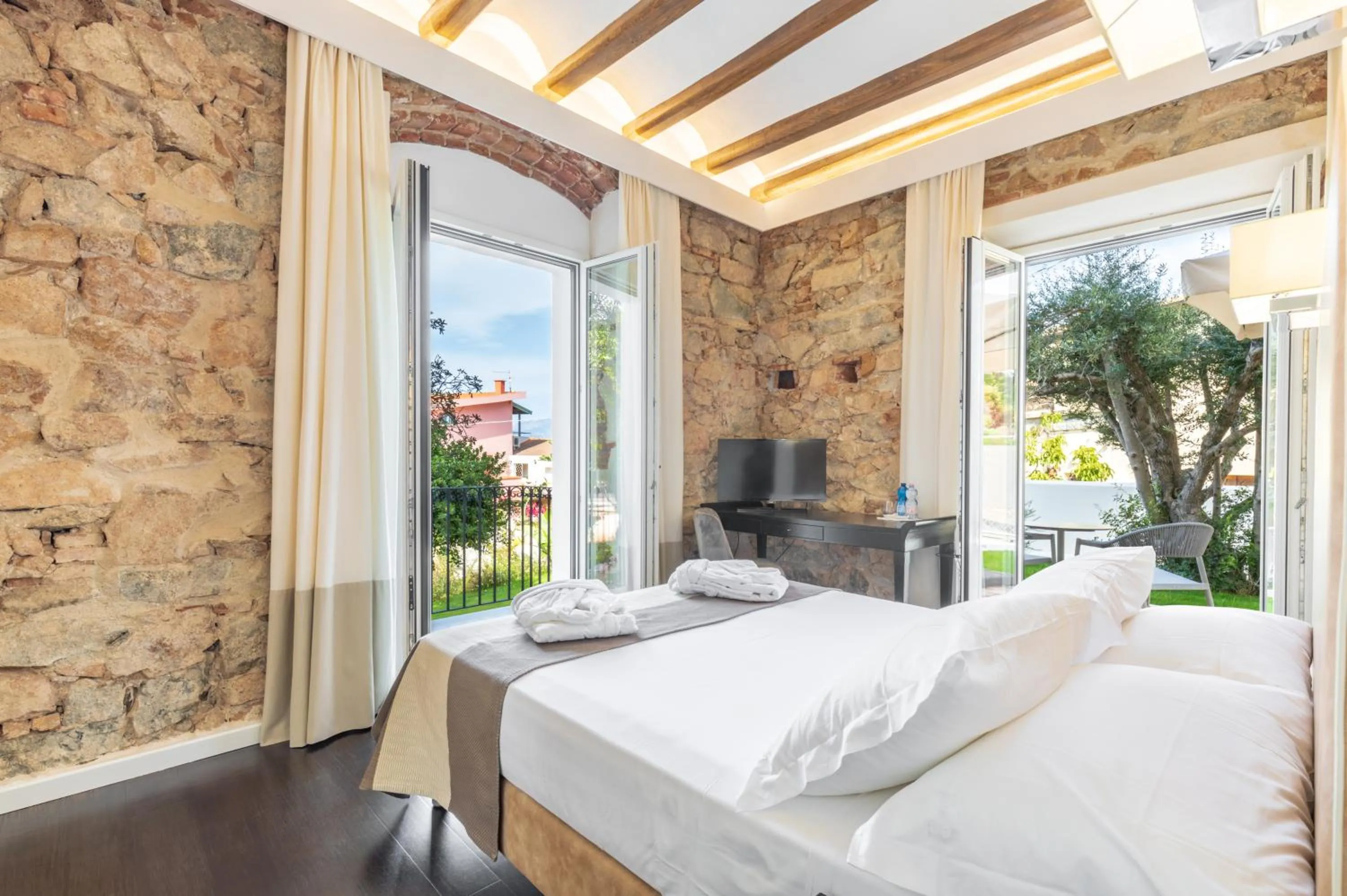 Patio, Bed in Raphael Hotel Arbatax