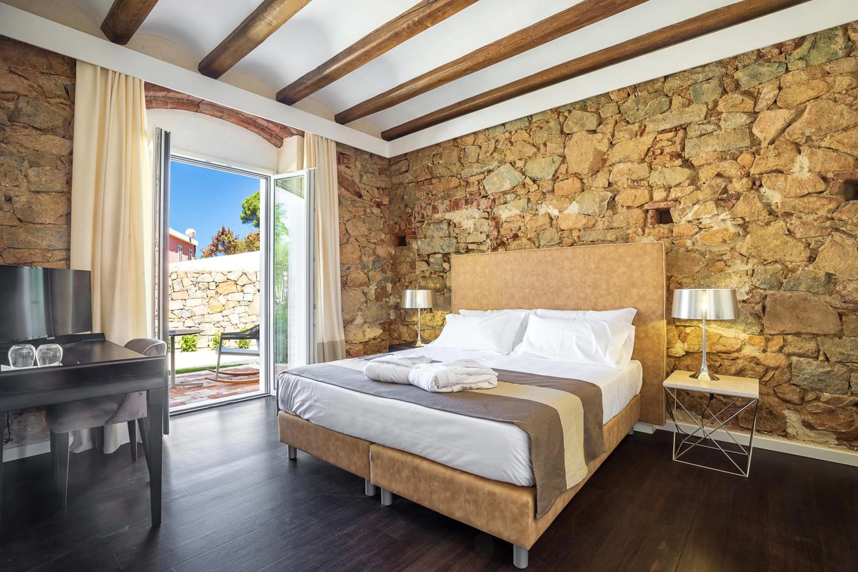 Garden view, Bed in Raphael Hotel Arbatax