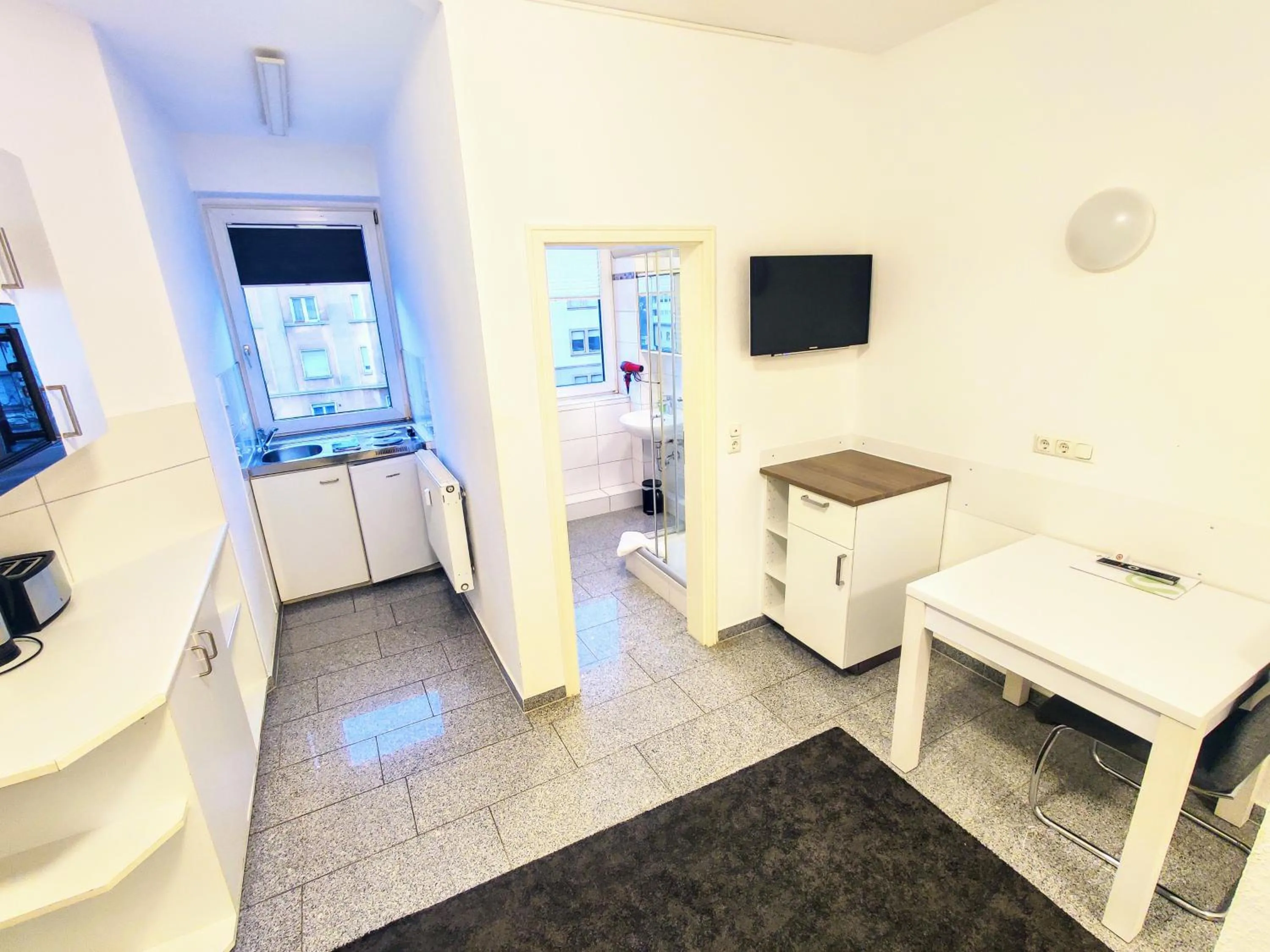 Kitchen or kitchenette in Boardinghouse - Stadtvilla Budget