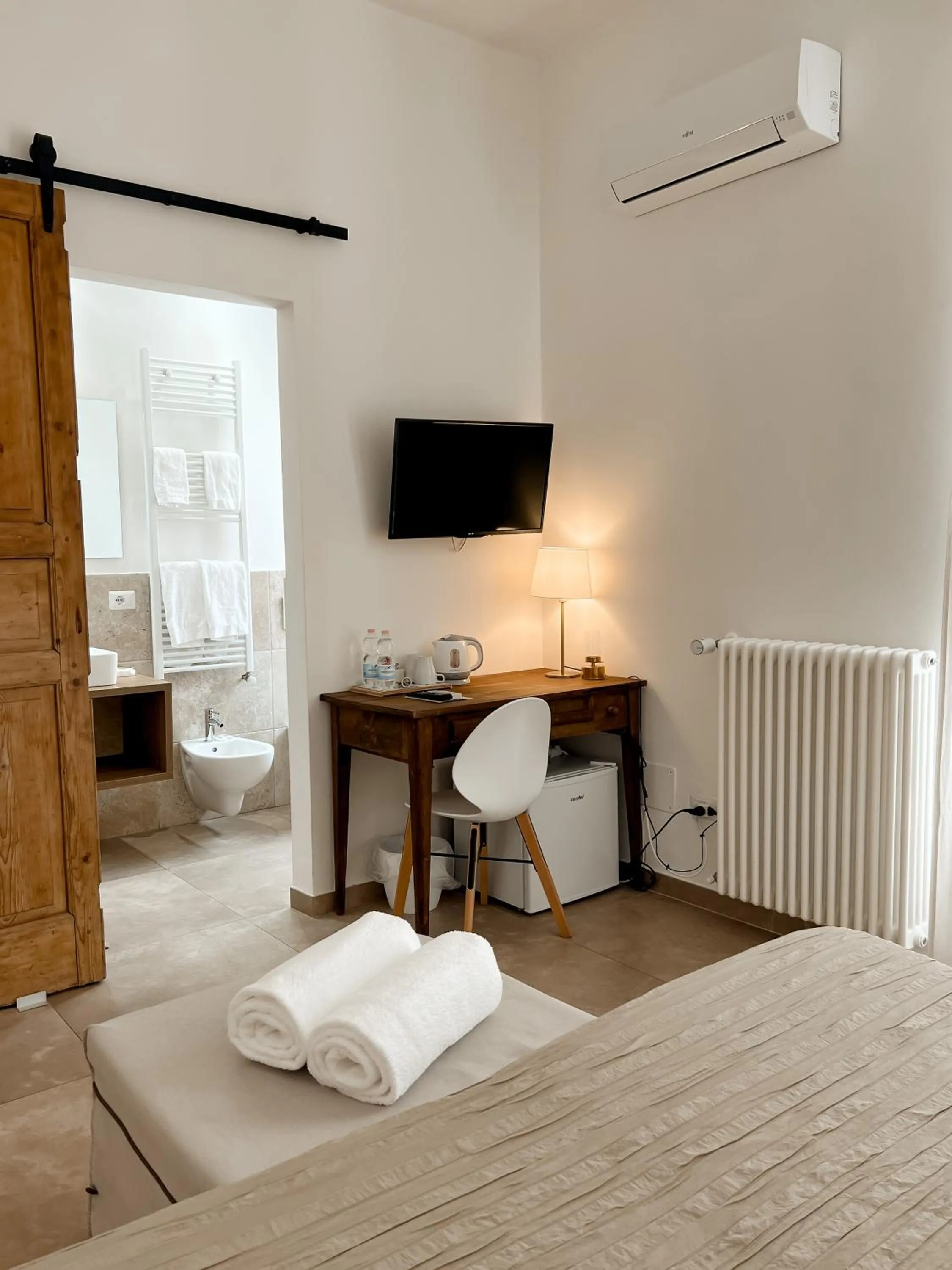 Bed in San Michele Rooms & Private SPA