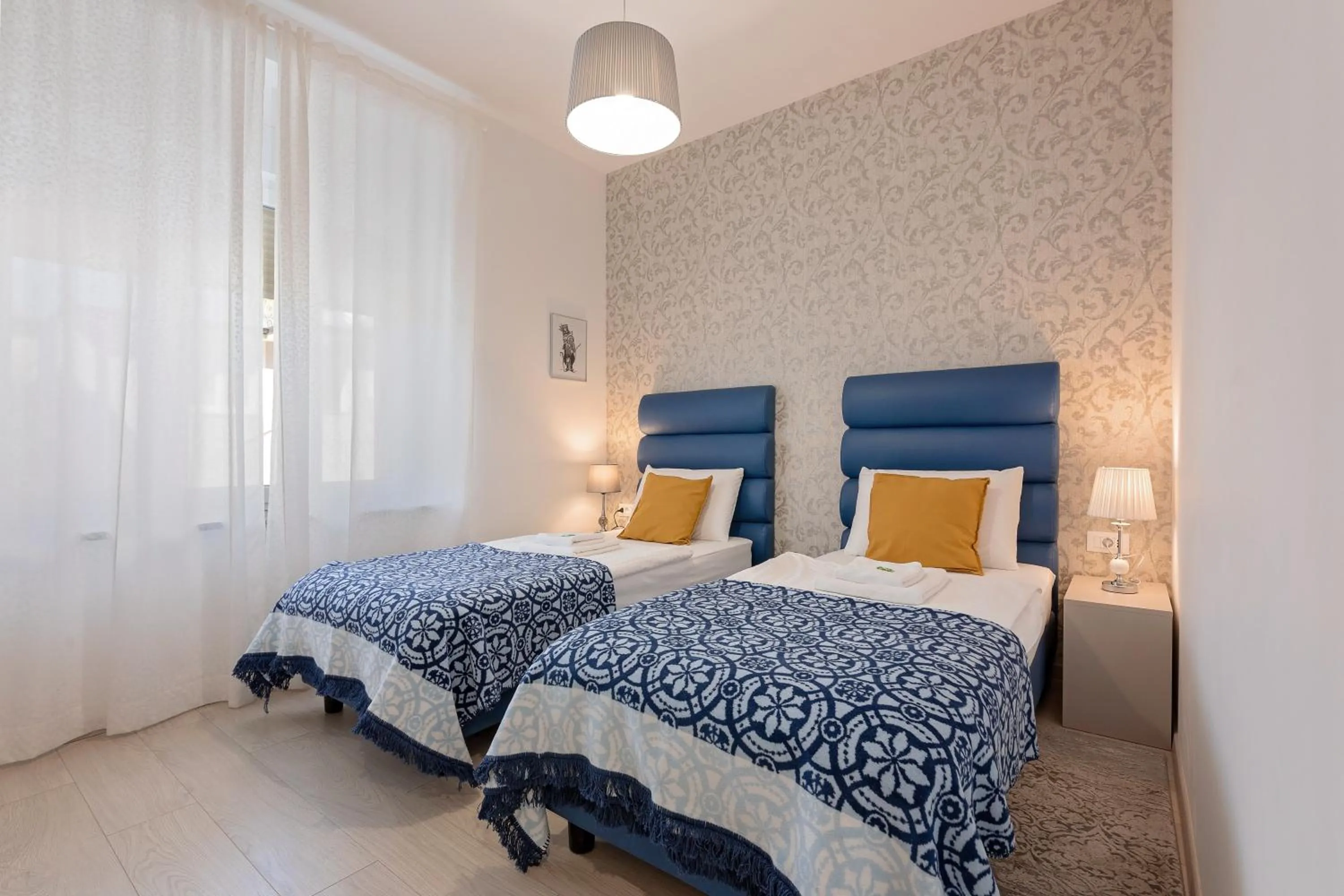 Decorative detail, Bed in S. Martino Rooms