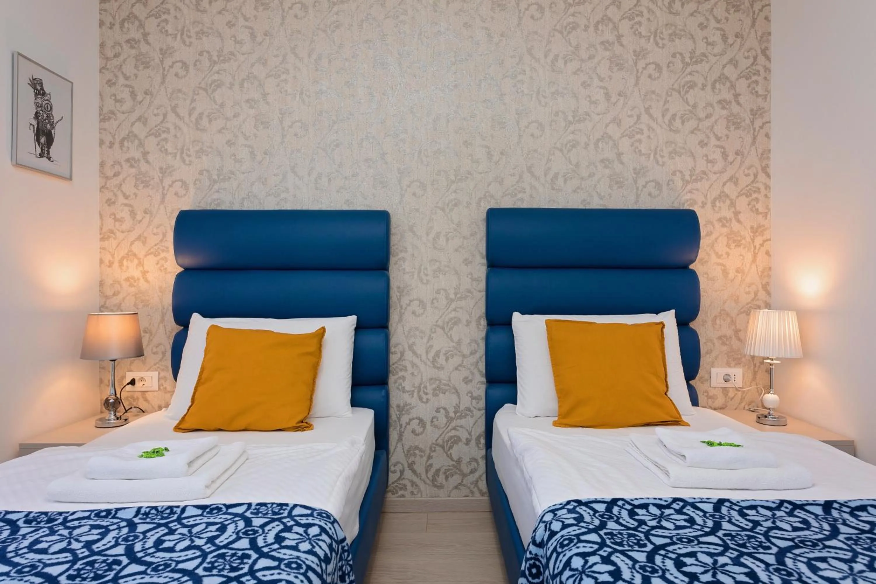 Decorative detail, Bed in S. Martino Rooms