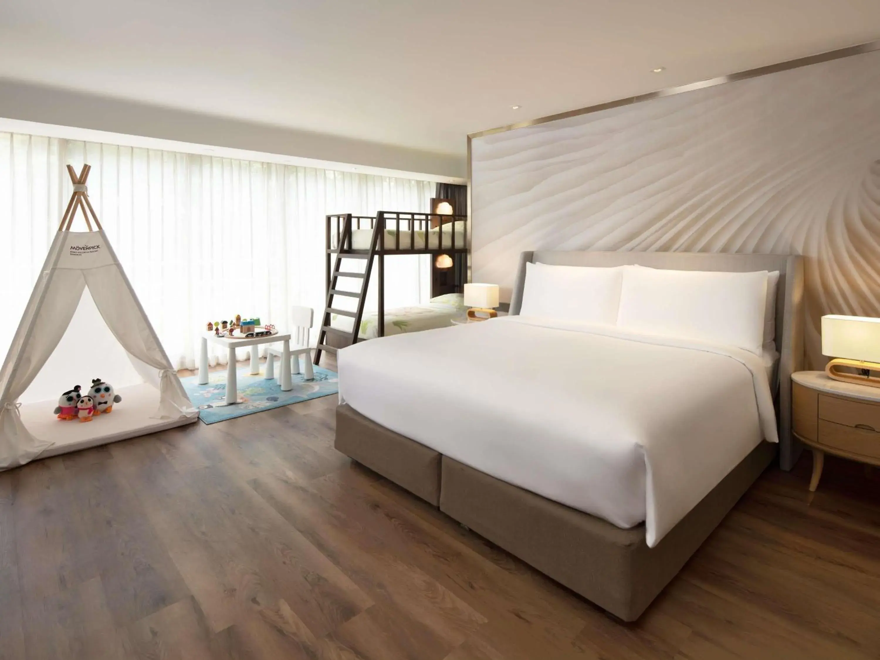 One-Bedroom Family Suite with One King Bed and Sofa Bed or Bunk Beds in Mövenpick BDMS Wellness Resort Bangkok One-Bedroom Family Suite with One King Bed and Sofa Bed or Bunk Beds in Mövenpick BDMS Wellness Resort Bangkok