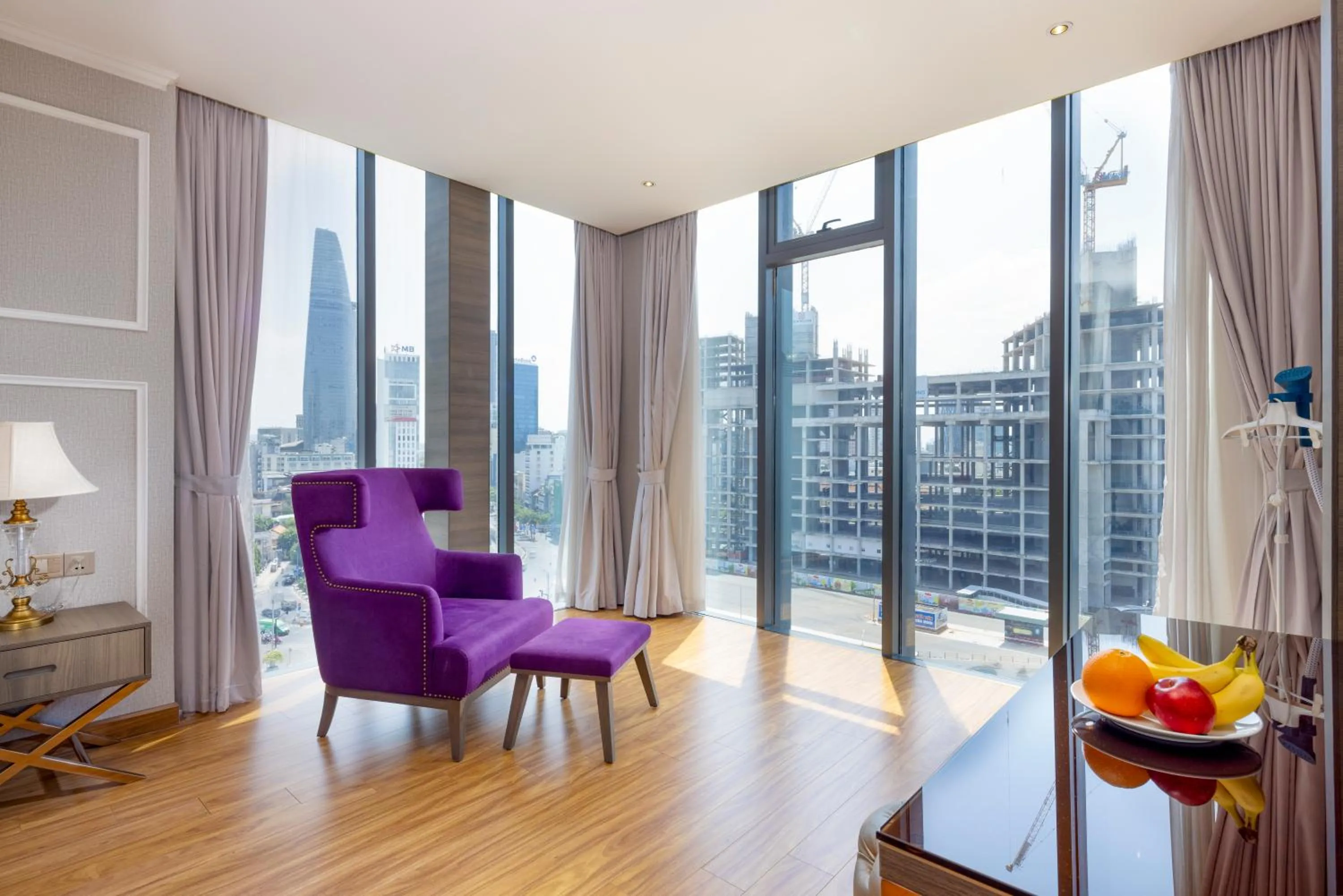 Seating area in Winsuites Saigon Hotel