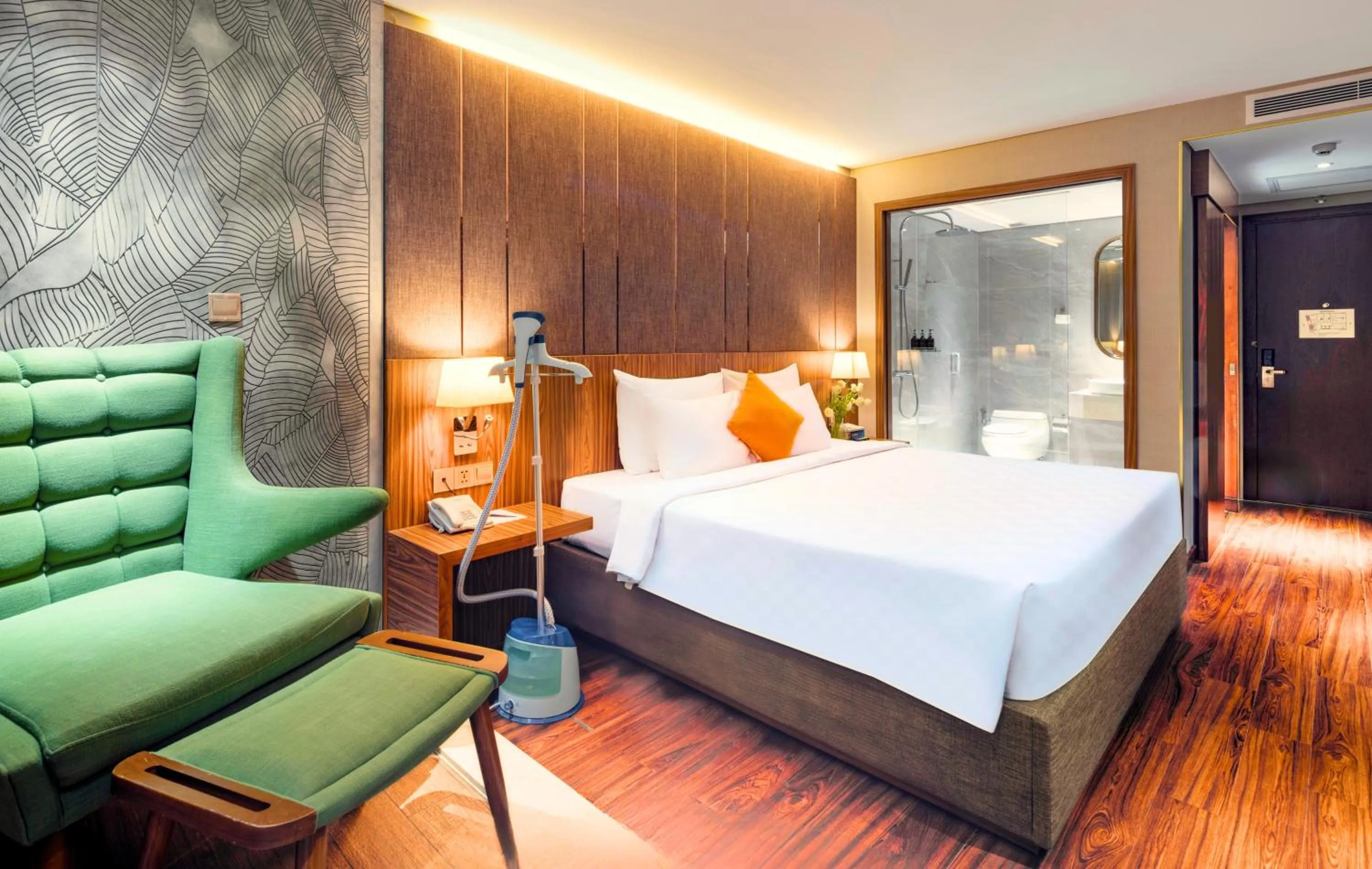 Bed in Winsuites Saigon Hotel