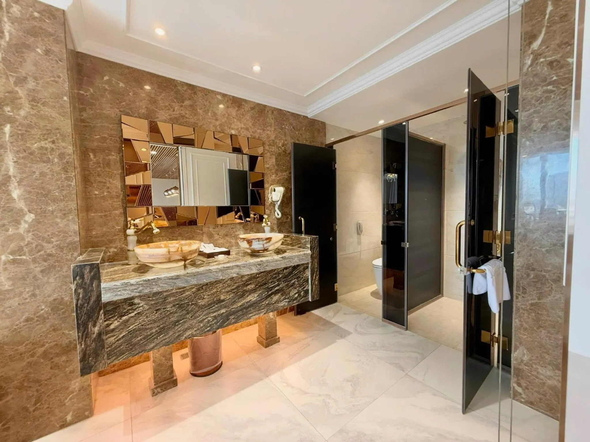 Bathroom in Winsuites Saigon Hotel