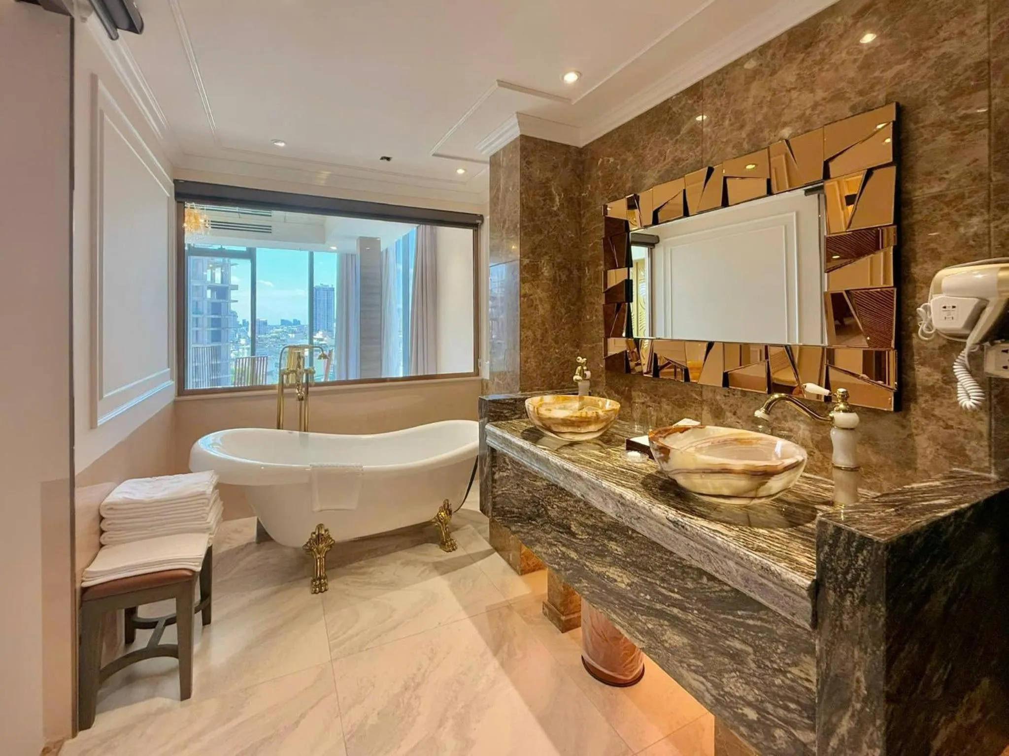 Bedroom in Winsuites Saigon Hotel