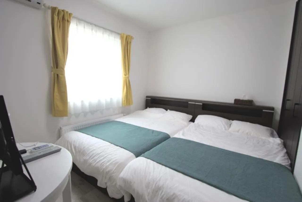 Bed in TEINE WHITE HOUSE