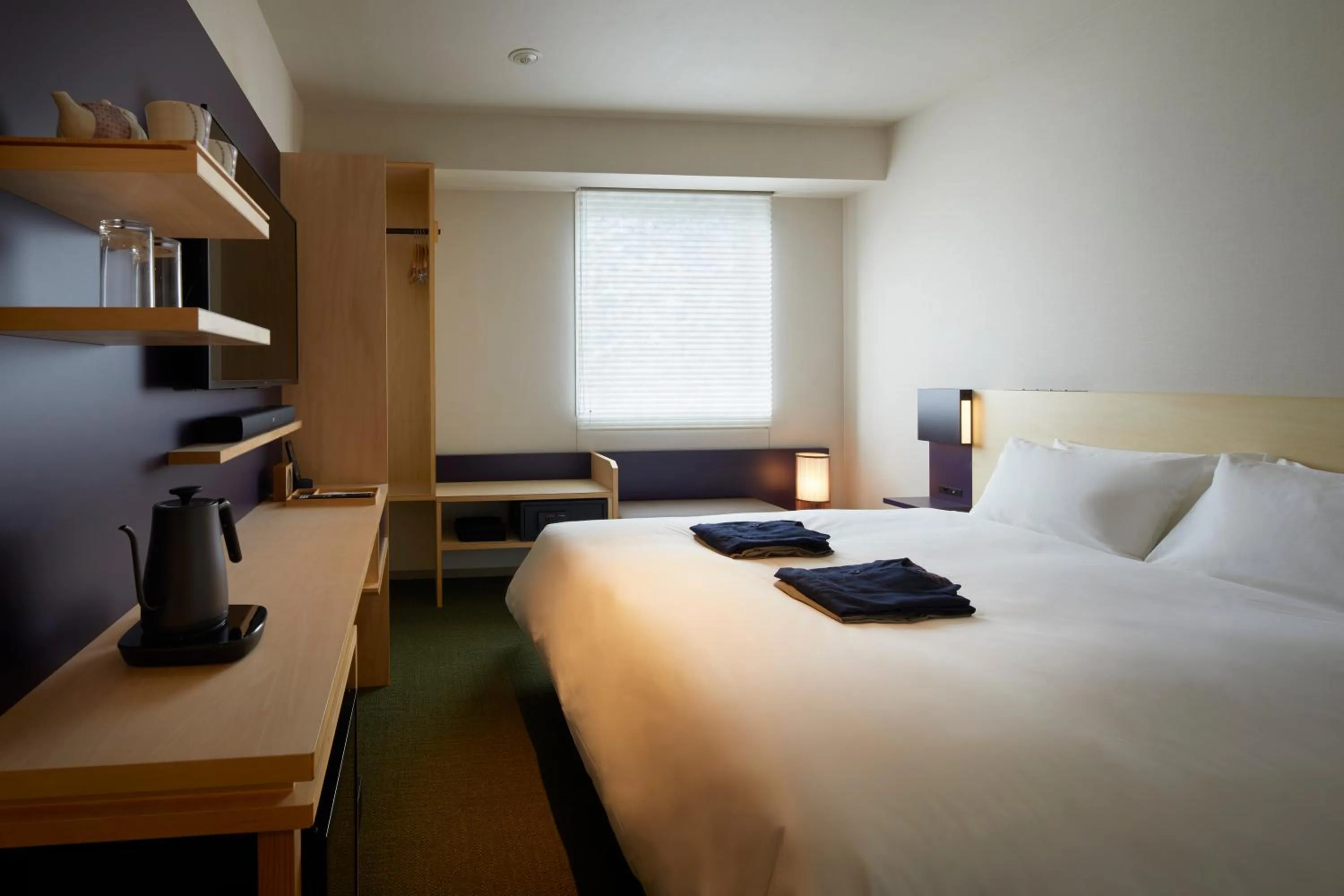 Photo of the whole room, Bed in HOTEL AMANEK Kanazawa