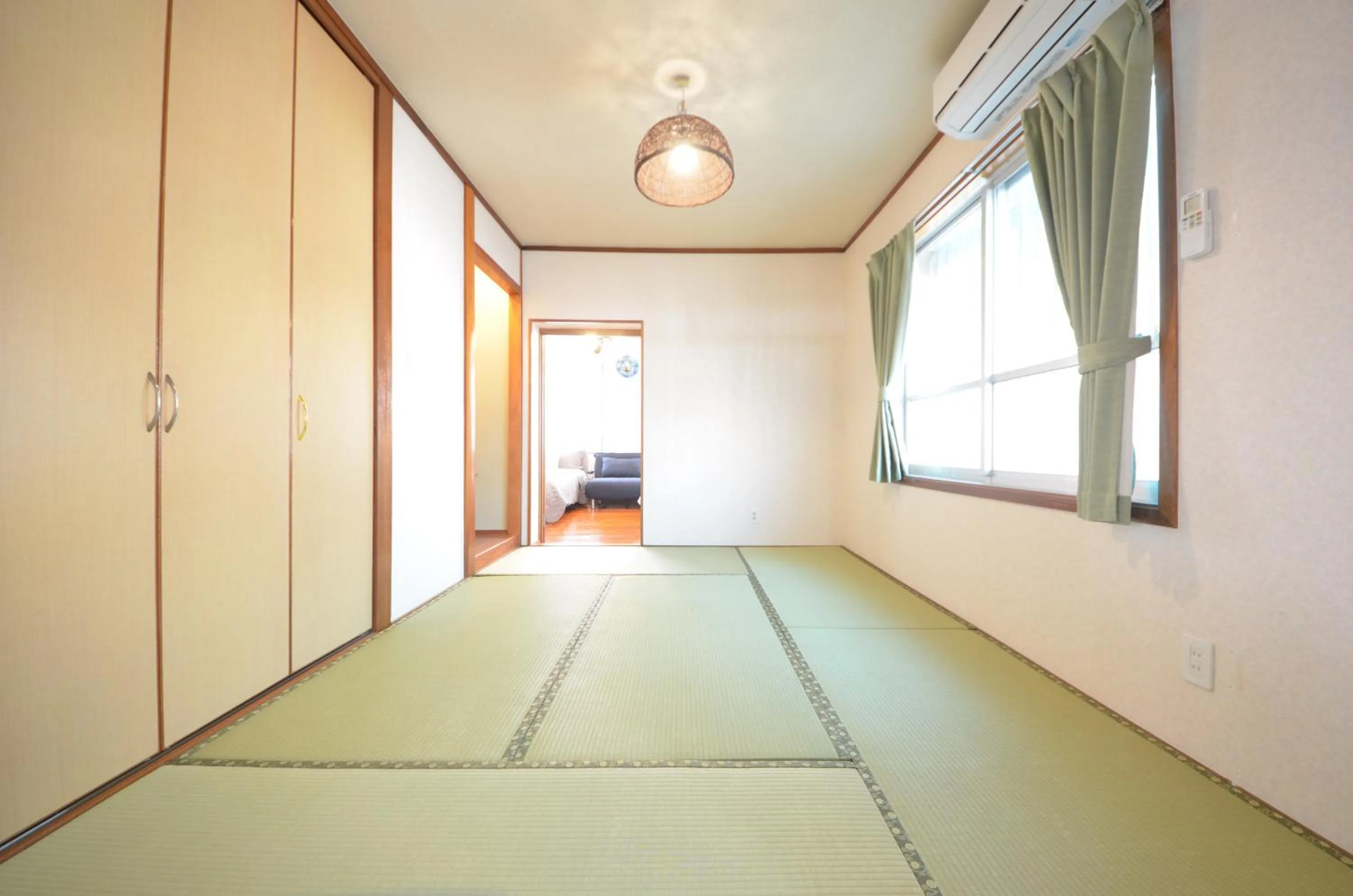 Bedroom in Sobe House in Yomitanson