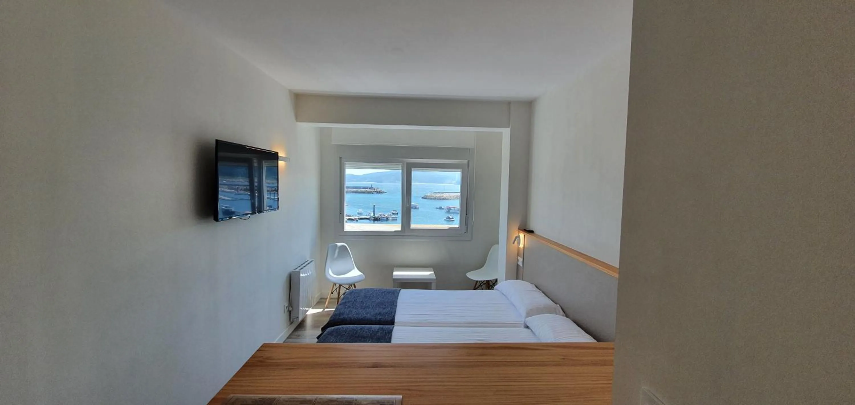 Bed in Apartamentos Costa da Morte Muxia