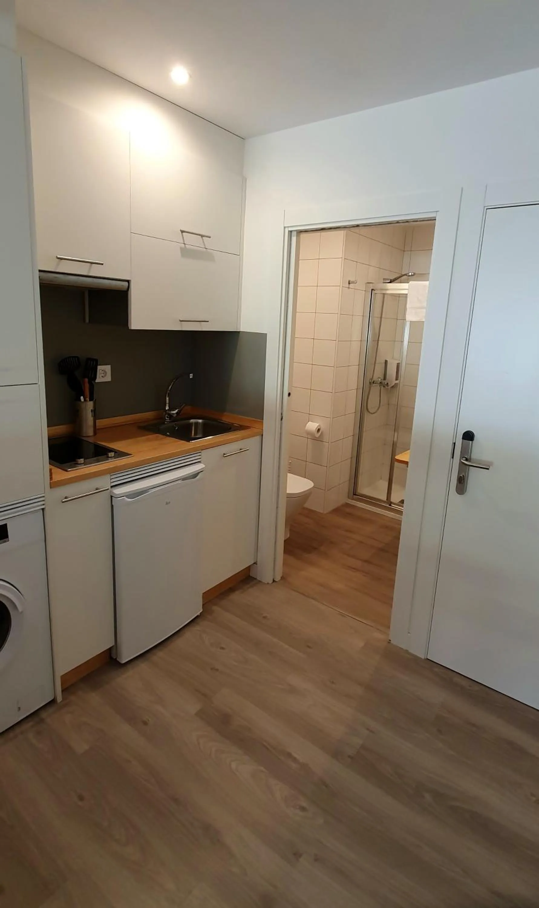 Kitchen or kitchenette in Apartamentos Costa da Morte Muxia