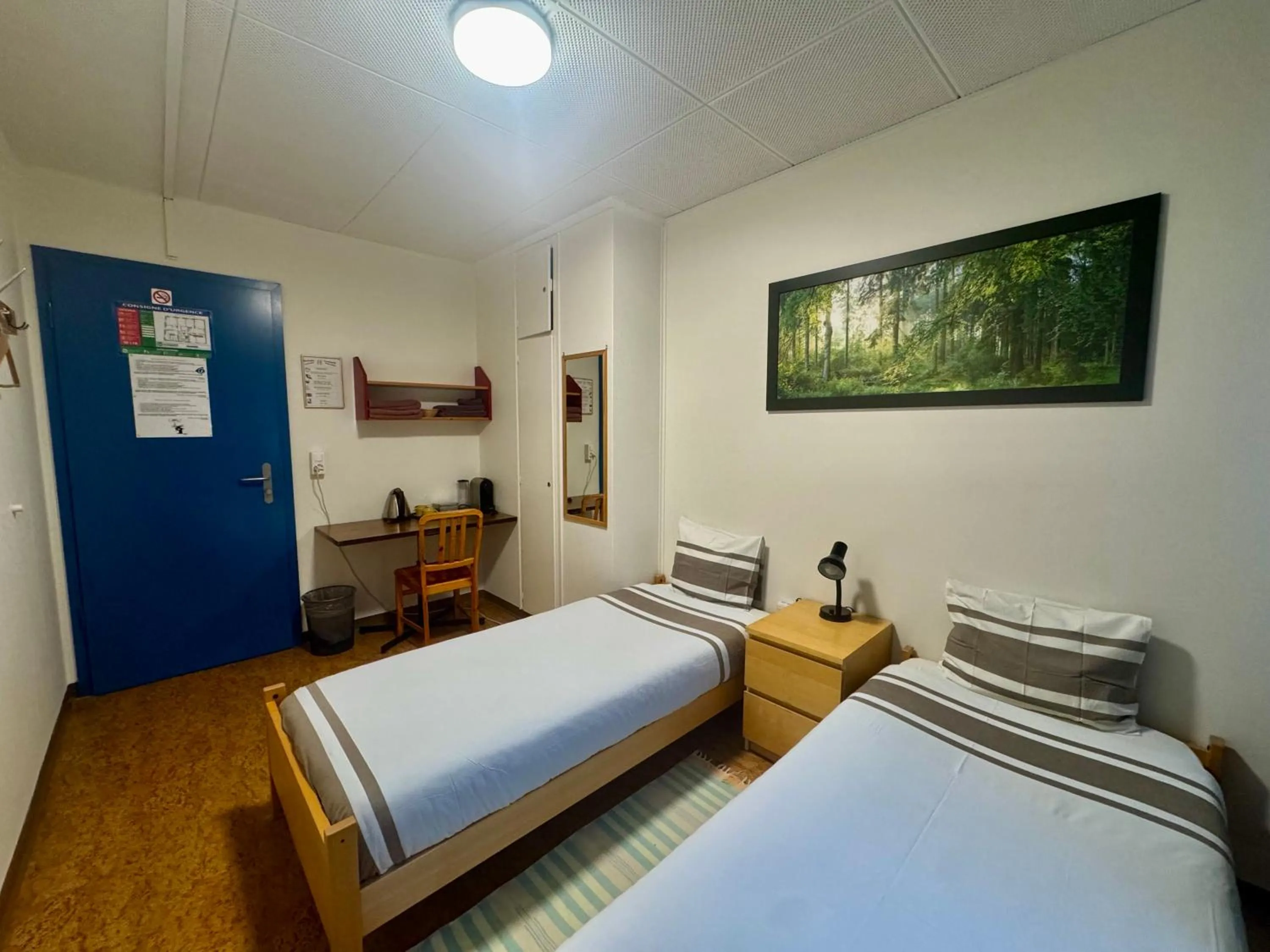 Bed in Auberge Pour Tous