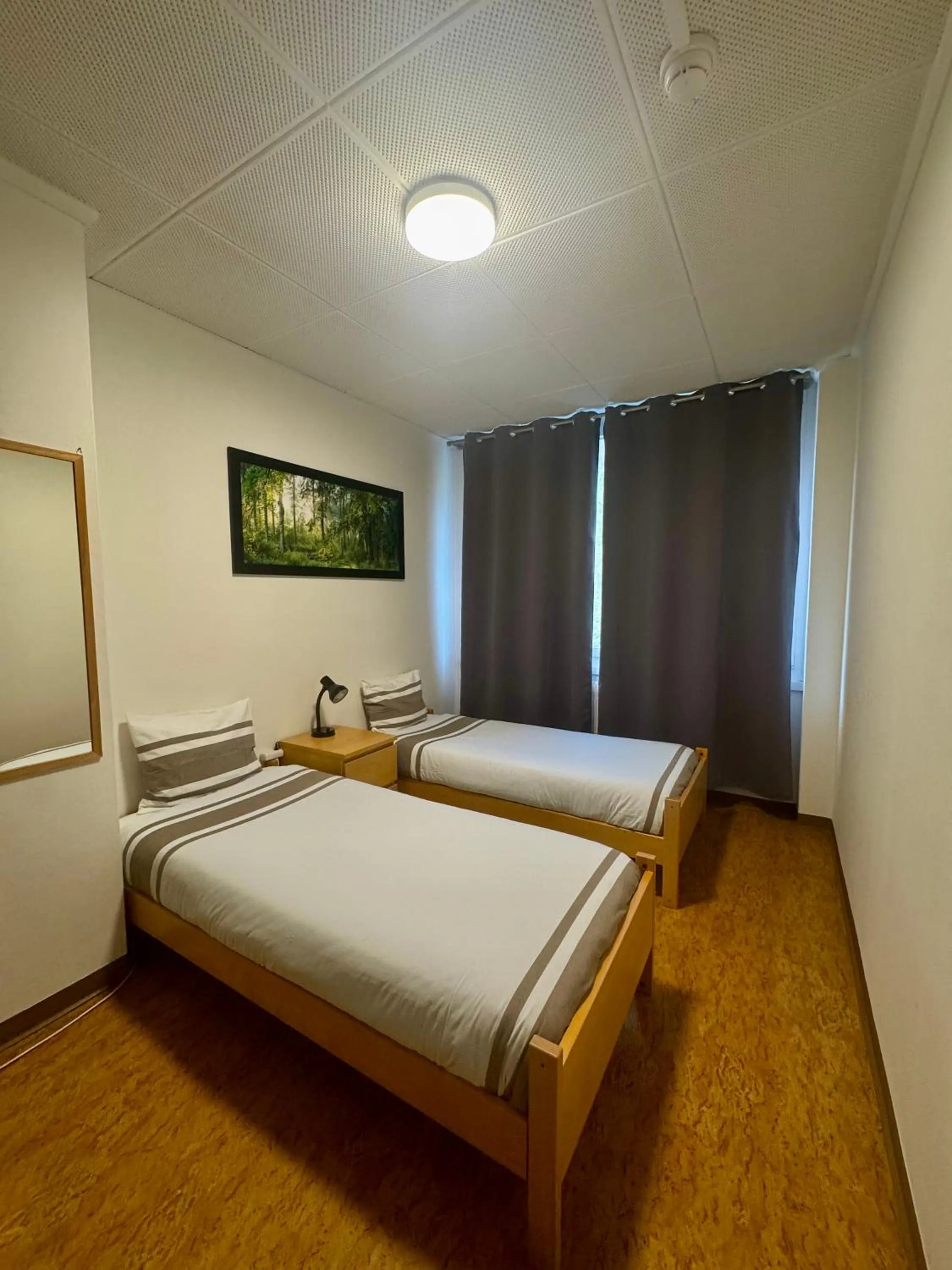 Bed in Auberge Pour Tous