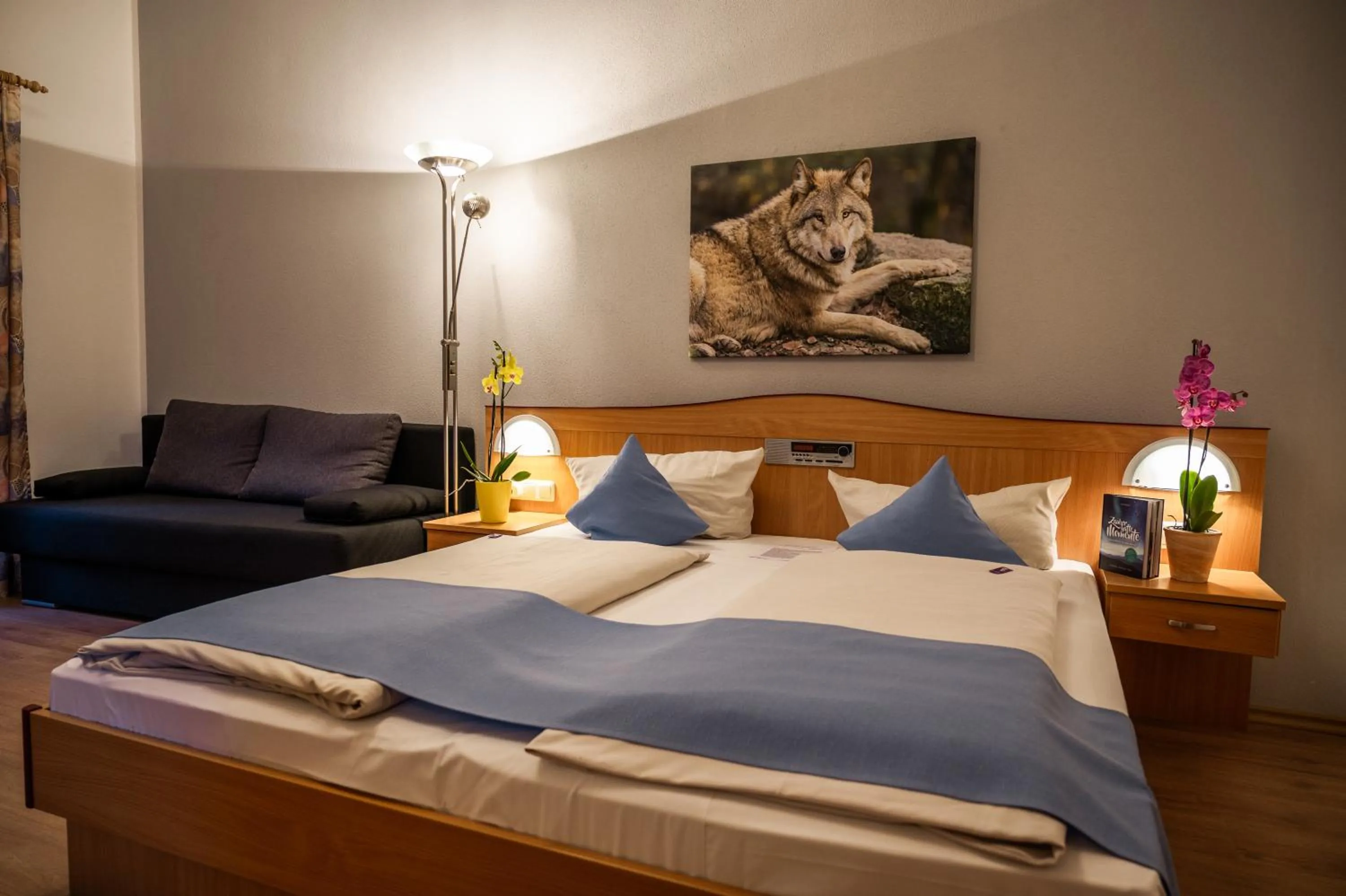 Living room, Bed in Landhotel Tannenhof